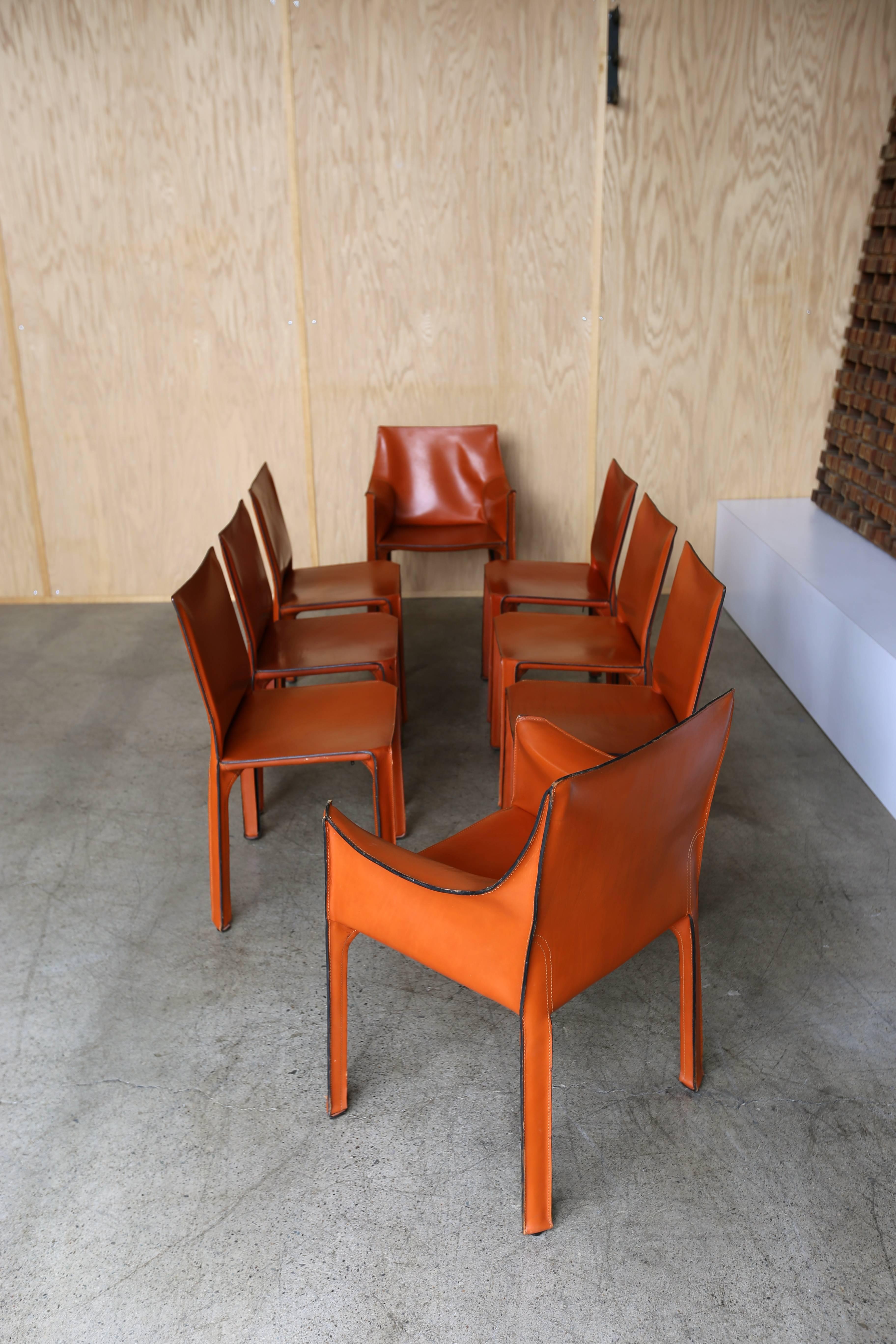 Set of eight Mario Bellini cab dining chairs for Cassina. 

The armchairs each measure: 22.5