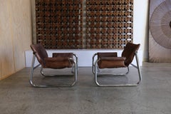 Patenated Leather "Alpha" Lounge Chairs by Maurice Burke for Pozza