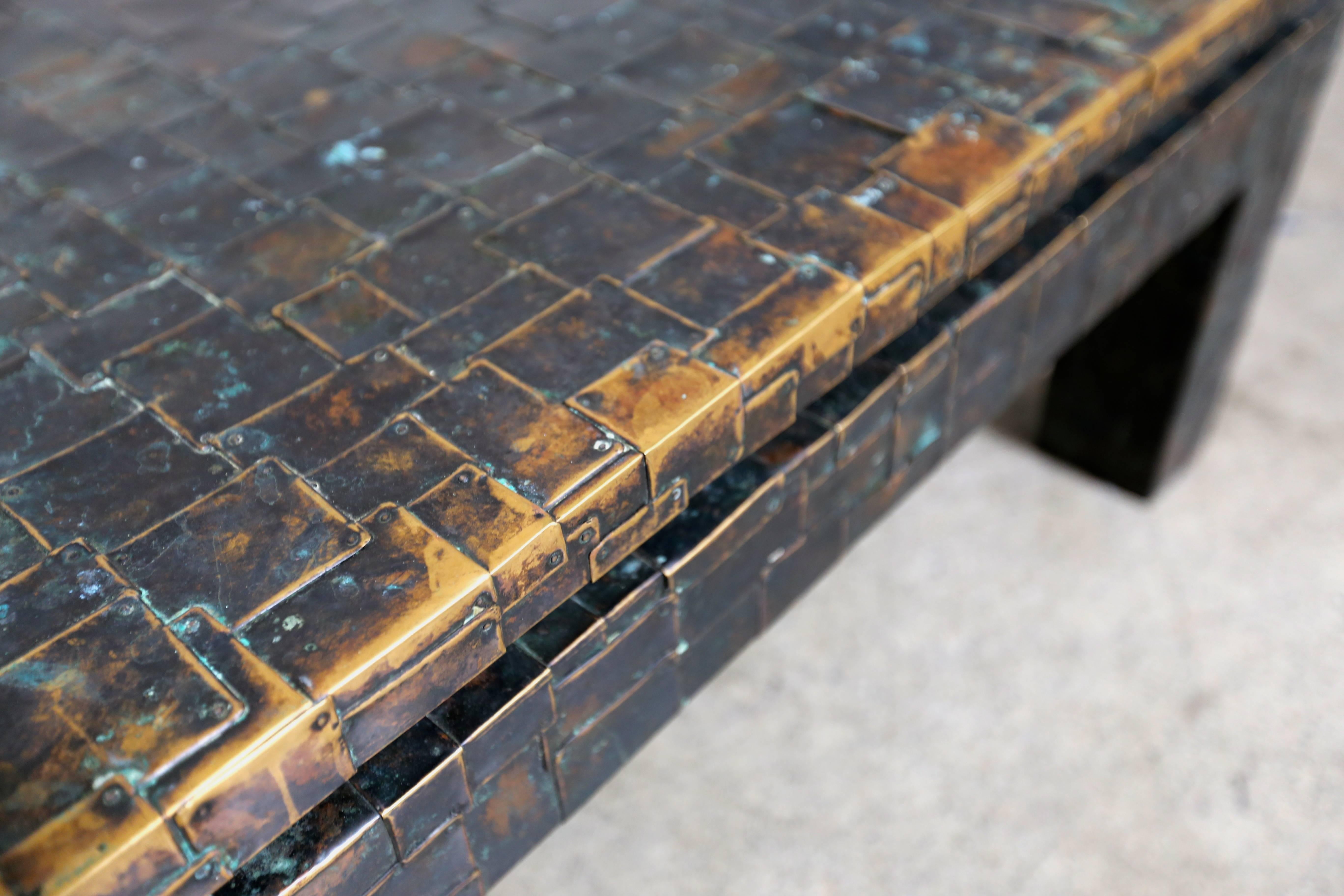 Brutalist patinated brass clad coffee table buy Maitland Smith.
   