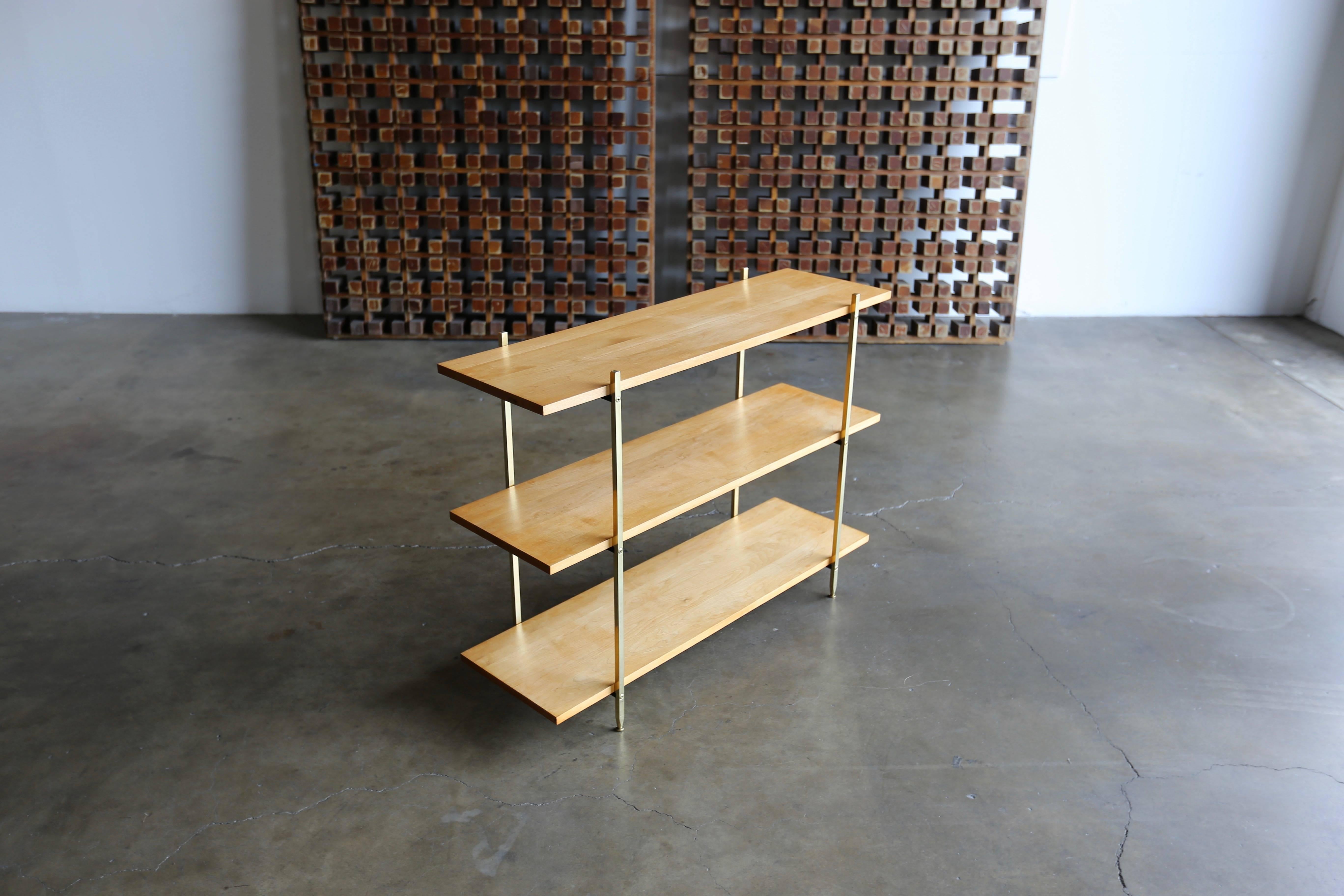 Maple and brass bookshelf by Milo Baughman for Murray Furniture. This piece has been professionally restored.