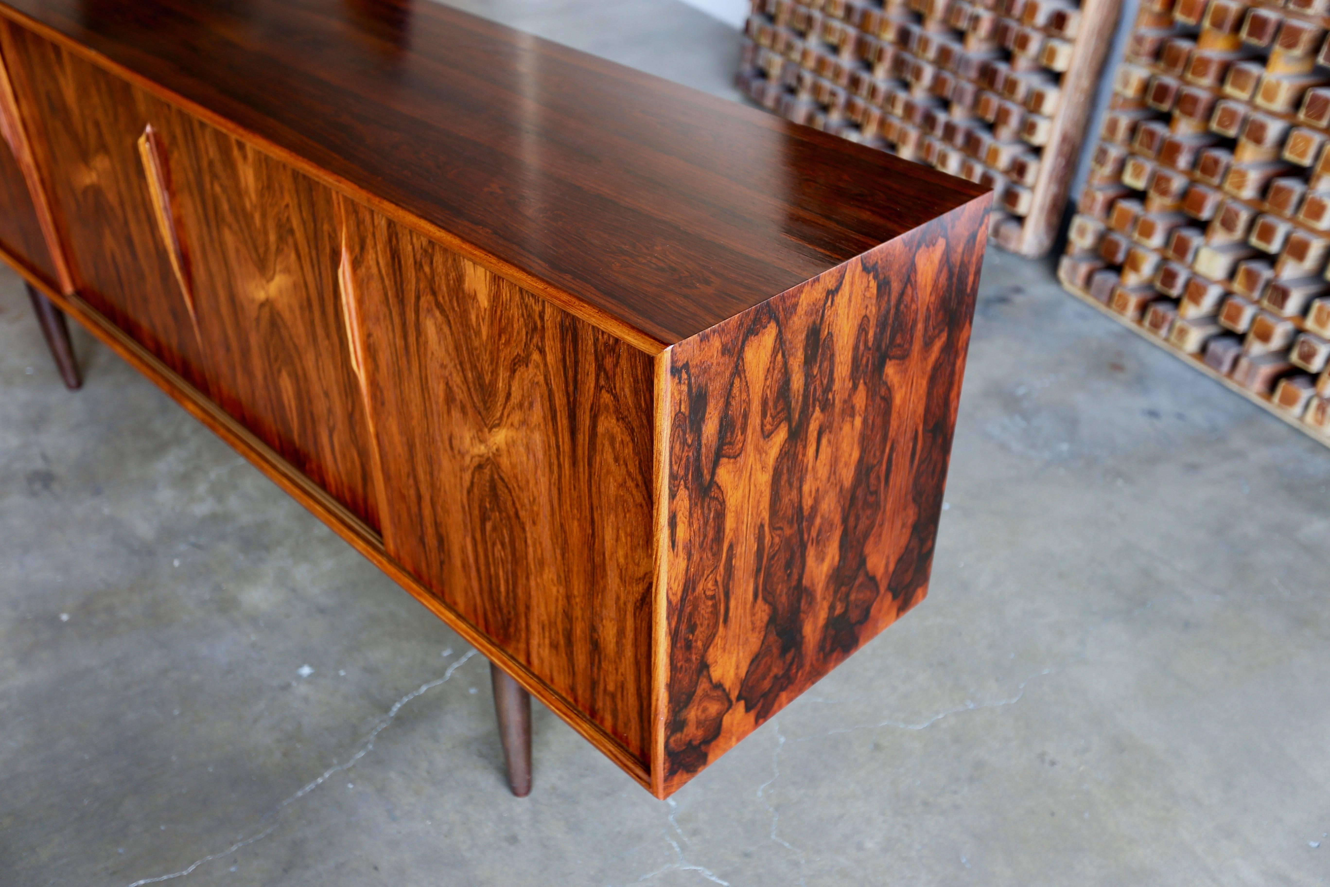 Rosewood designed by Gunni Omann for Axel Christensen Odder. (ACO). Highly figured rosewood grain from every angle.