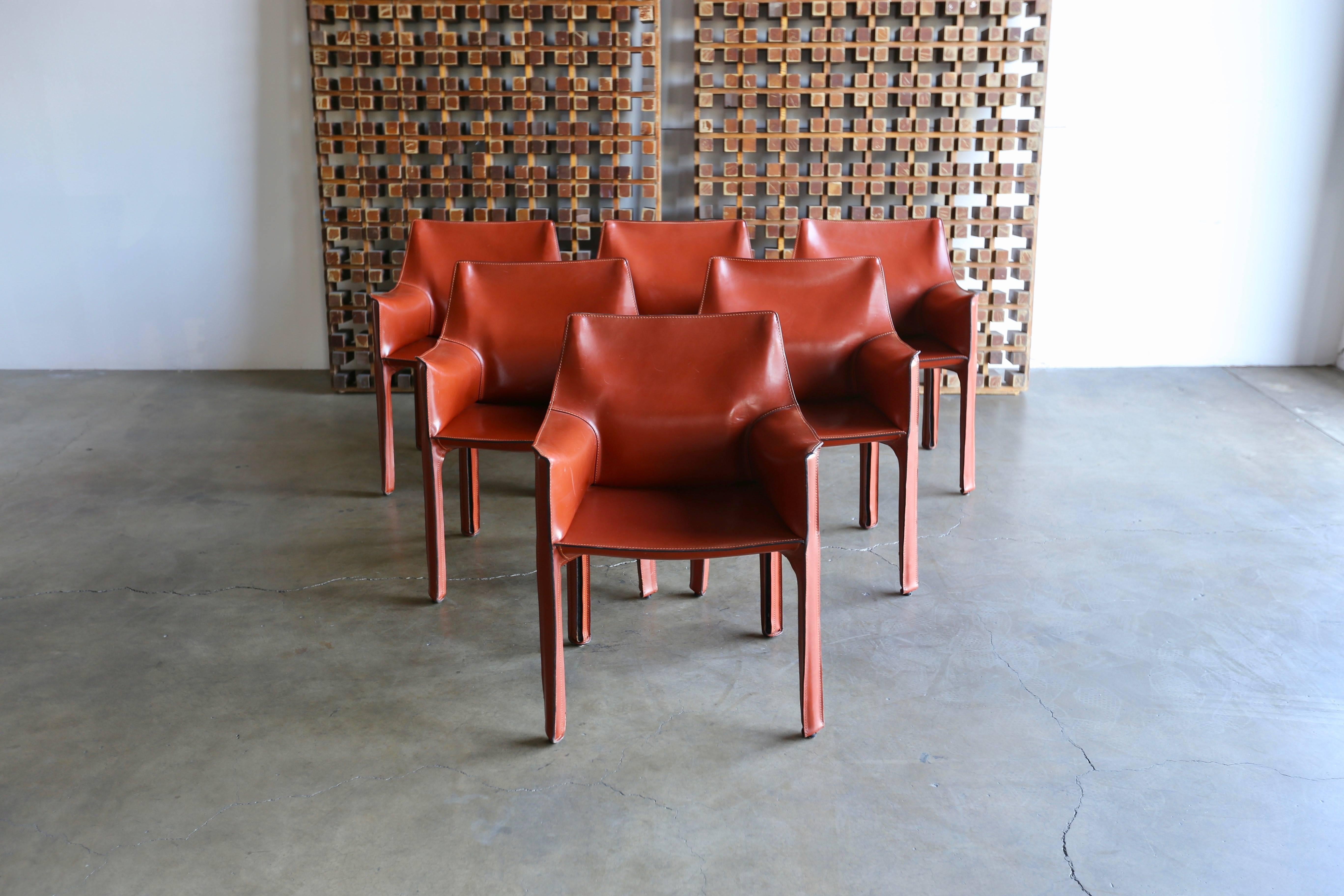 Set of six leather CAB armchairs by Mario Bellini for Cassina. 

The listed price is for one set of six chairs.  We have two sets of six chairs available. 

