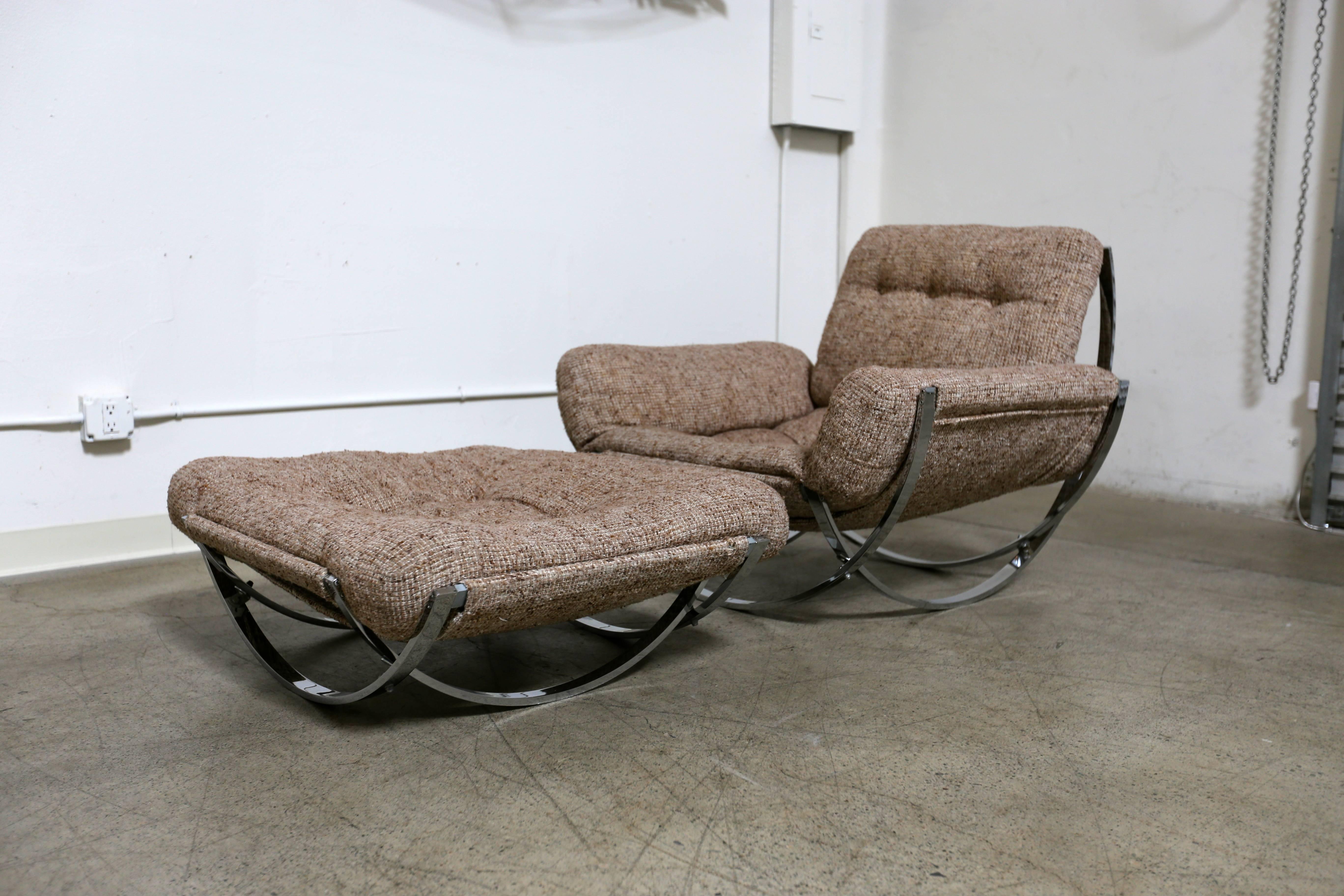 Sculptural lounge chair and ottoman. 

The chair measures: 41