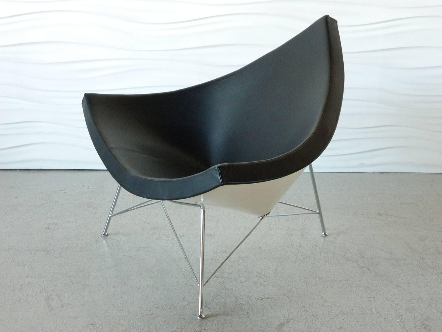This 2007 re-edition of George Nelson's iconic Coconut chair was manufactured by Vitra Furniture.