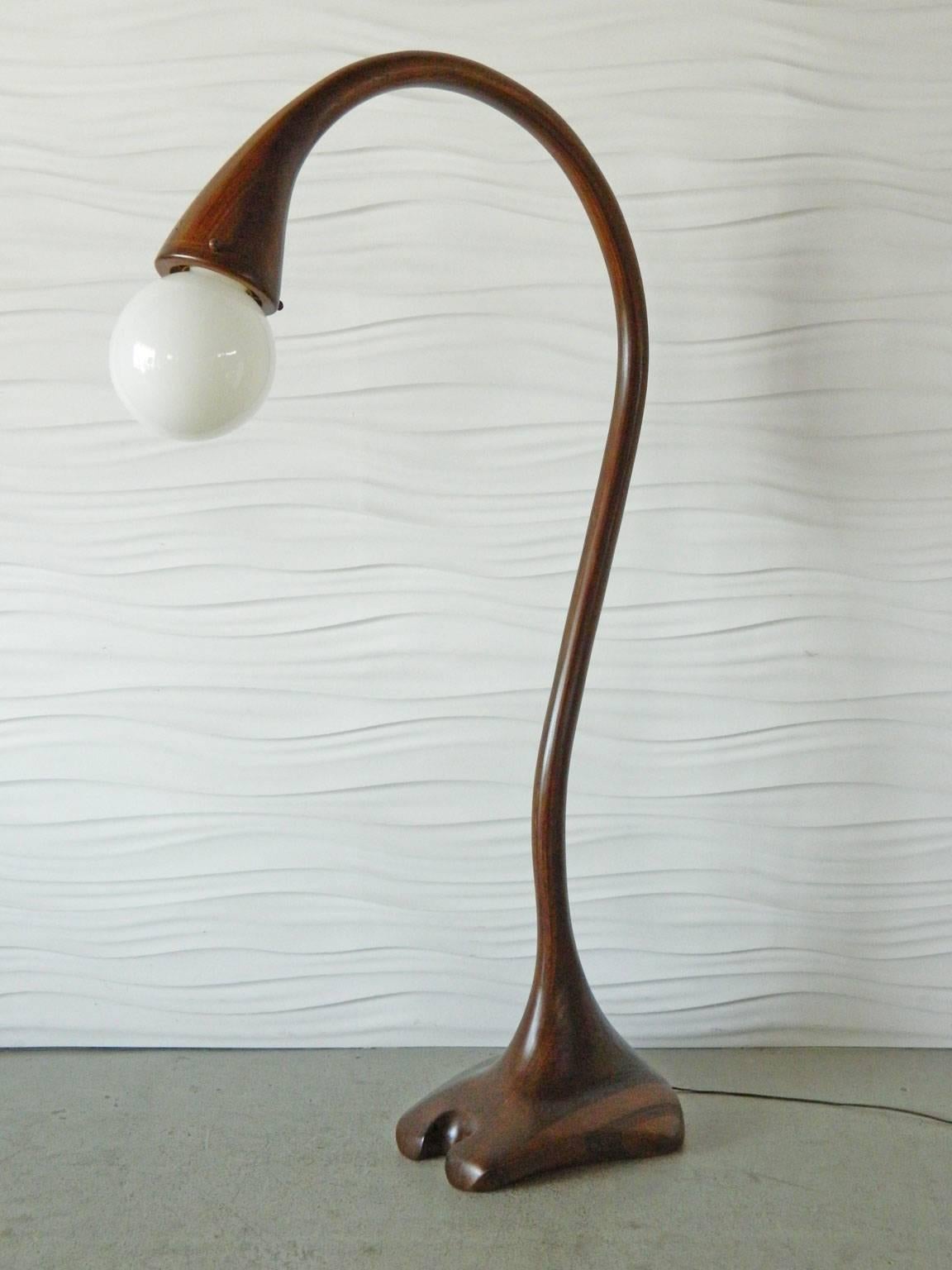 This unusual studio floor lamp features a graceful, biomorphic profile.