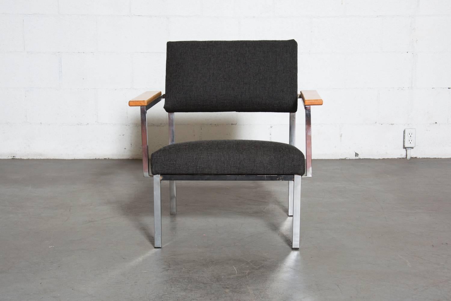 Mid-Century, chrome framed chair with new charcoal upholstered seat and backrest and contrasting blonde armrests. Designed by Martin Visser for 't Spectrum in the early 1960s.  Wood is in original condition. Chrome has some areas of pitting and