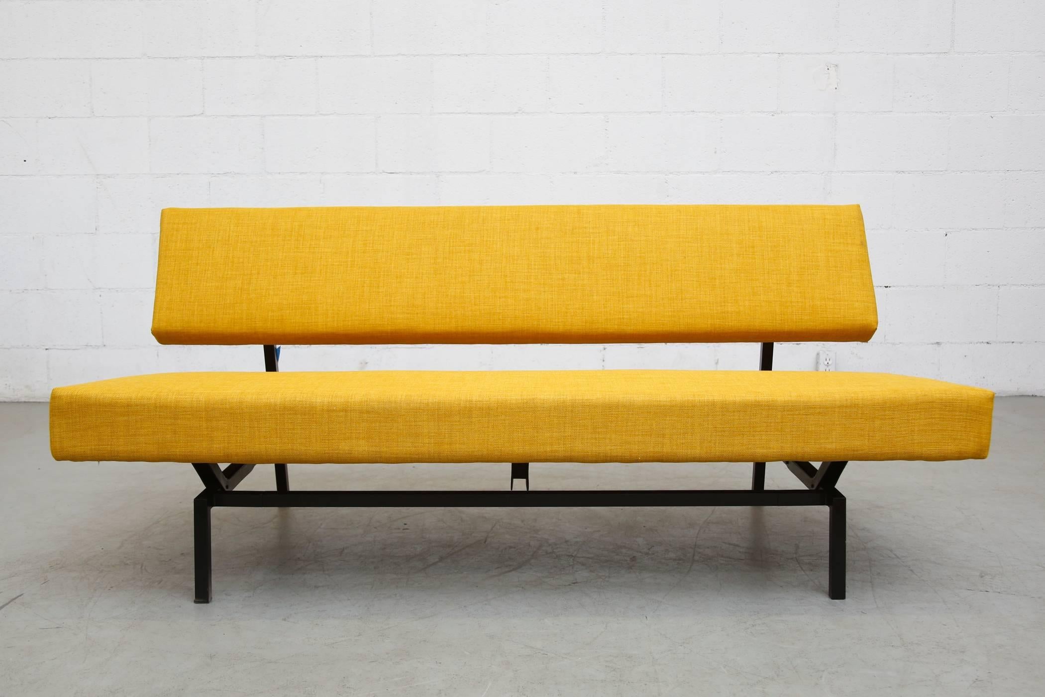 Streamline Martin Visser Style Sofa for 't spectrum newly re-upholstered in bright yellow. Some wear to frame consistent with age and use.