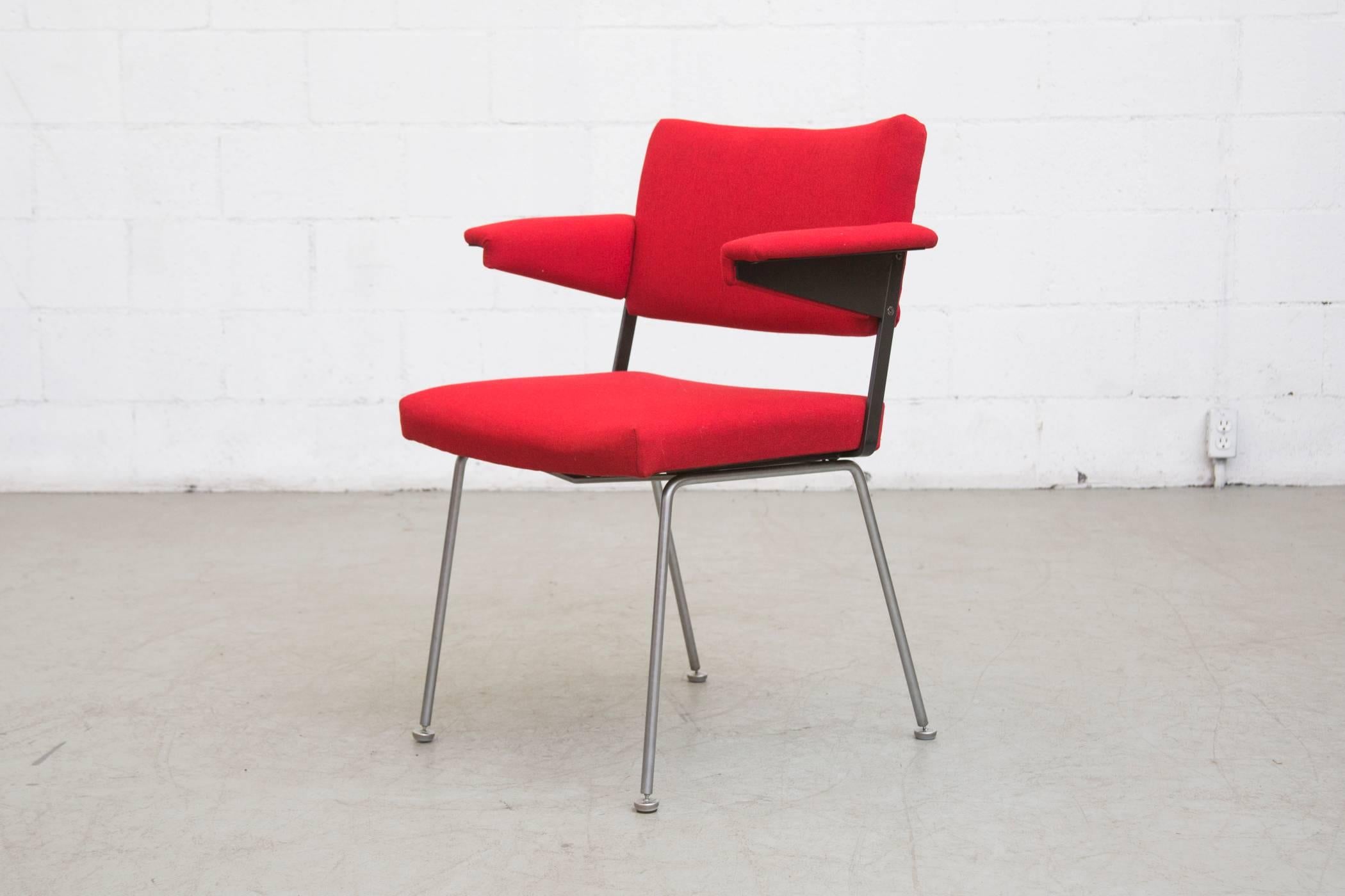 Great architectural chair in new flame red fabric with wide body, prouve style armrests, black enameled metal frame and brushed steel legs. Frame in original condition. Set price.