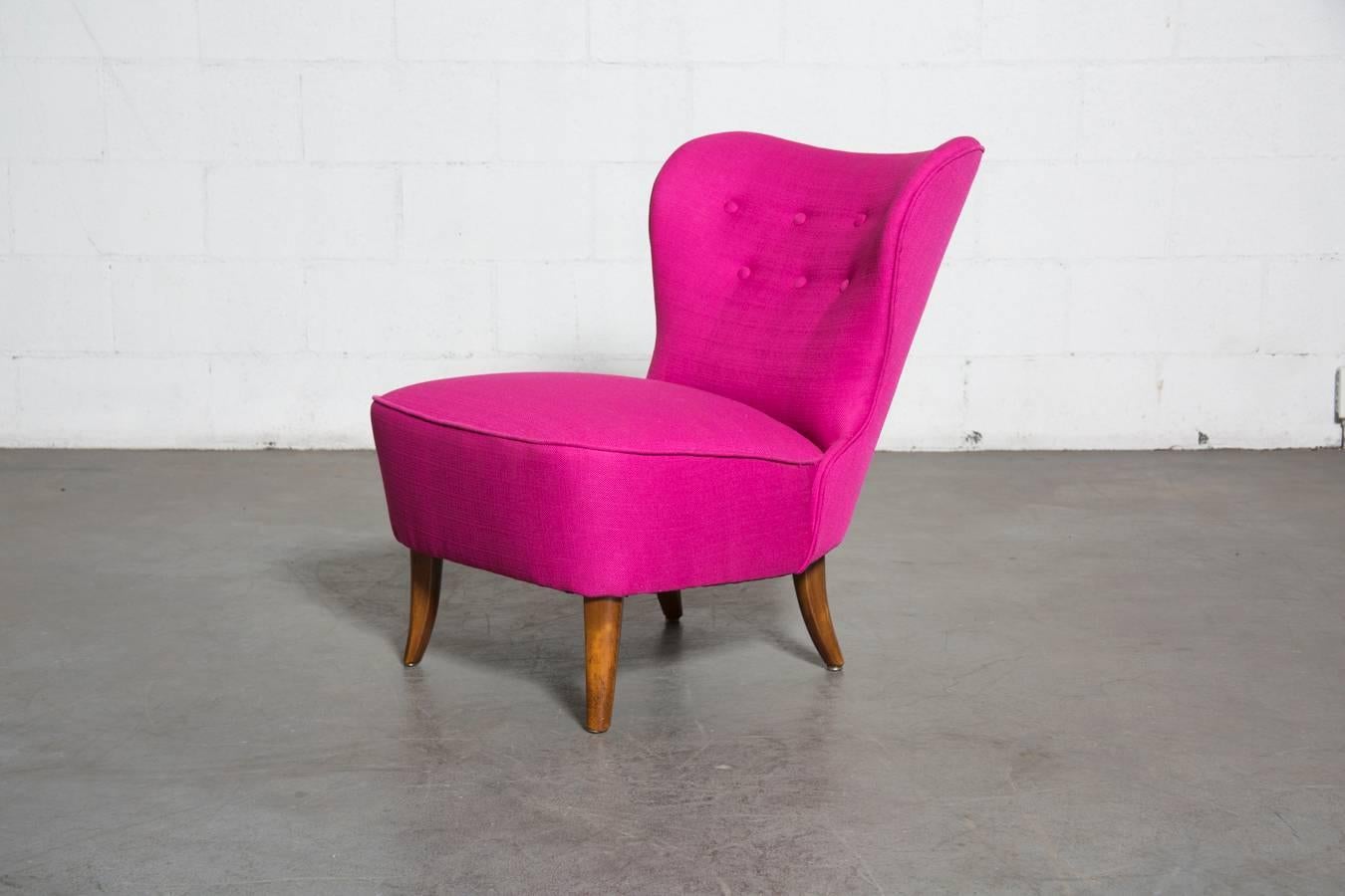 Girly pop of pink in this armless Theo Ruth lounge chair for artifort. Newly re-upholstered. Wood in original condition.