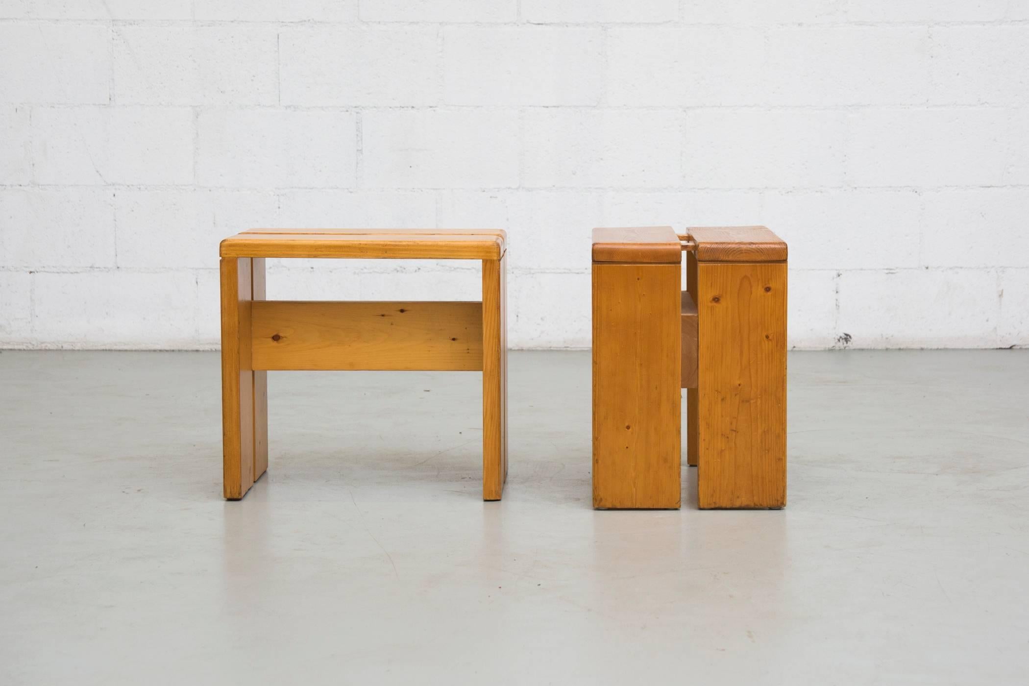 Charlotte Perriand solid pine stools from Les Arcs, France, circa 1968. In good original condition with some wear to surface consistent with age and use. Set price.