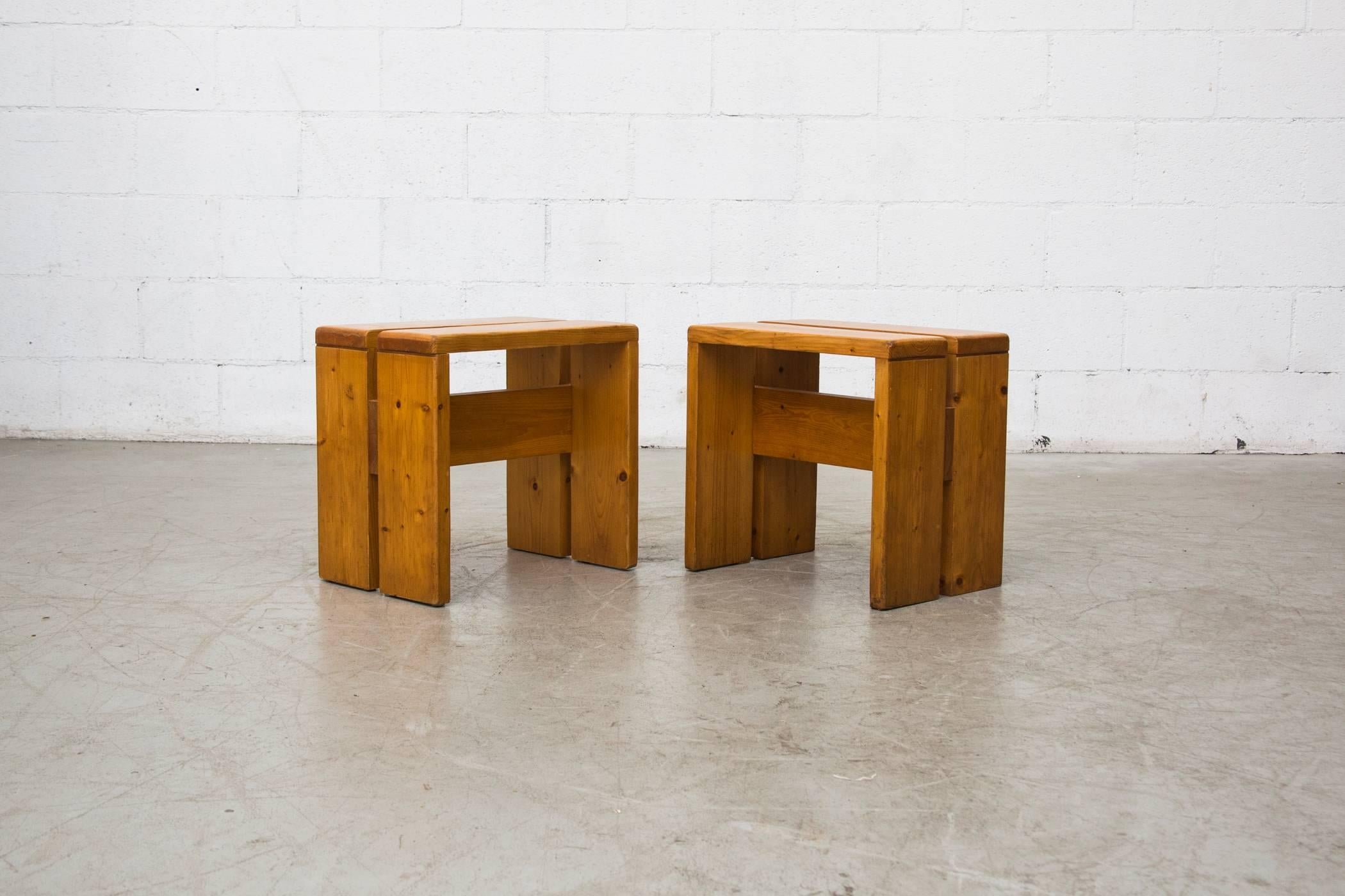 Charlotte Perriand solid pine stools from Les Arcs, France, circa 1968. In good original condition with some wear to surface consistent with age and use. Set price.