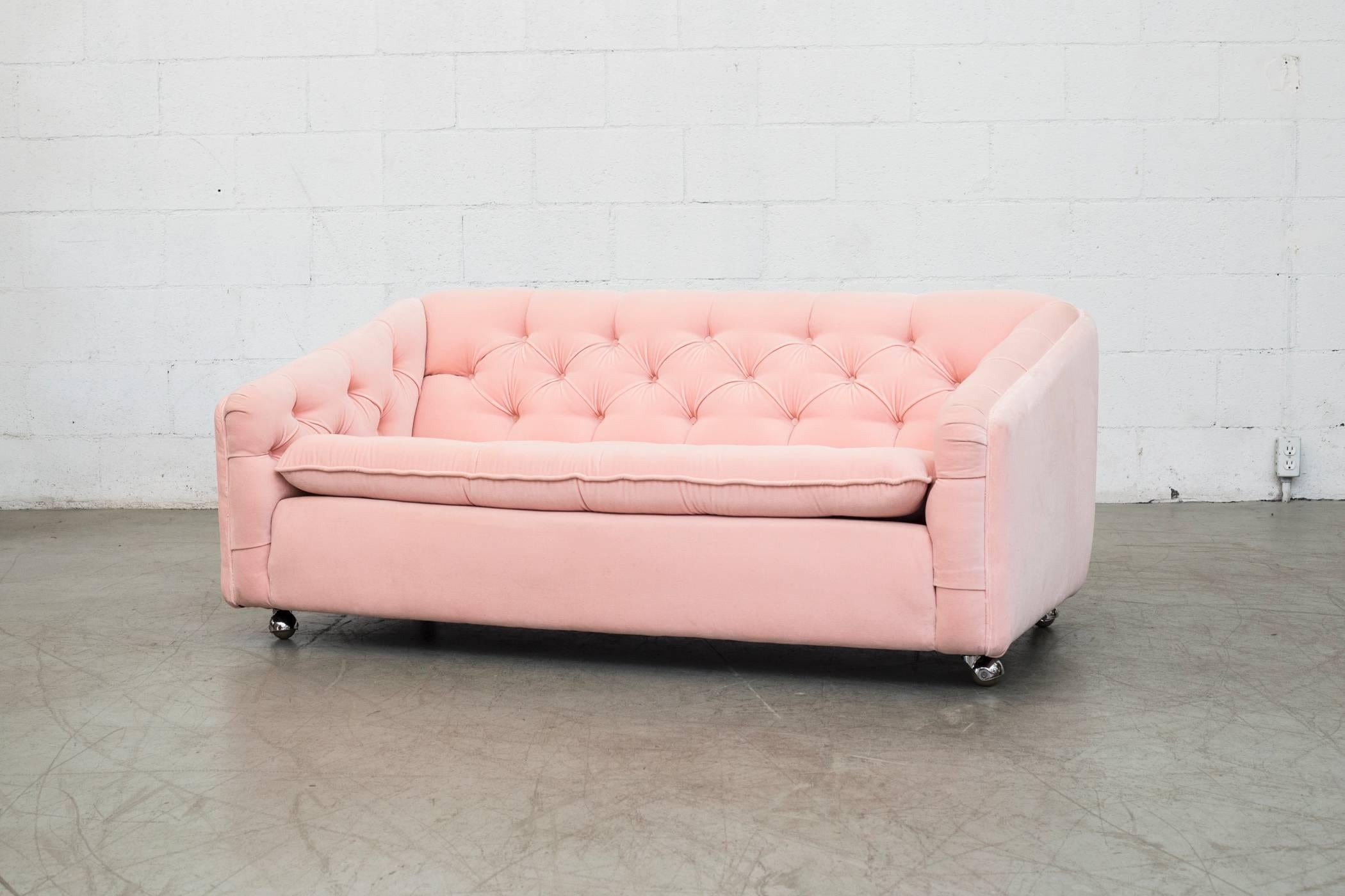 Sweet Little Geoffrey Harcourt for Artifort newly pink velvet upholstered two-seat loveseat on wheels.