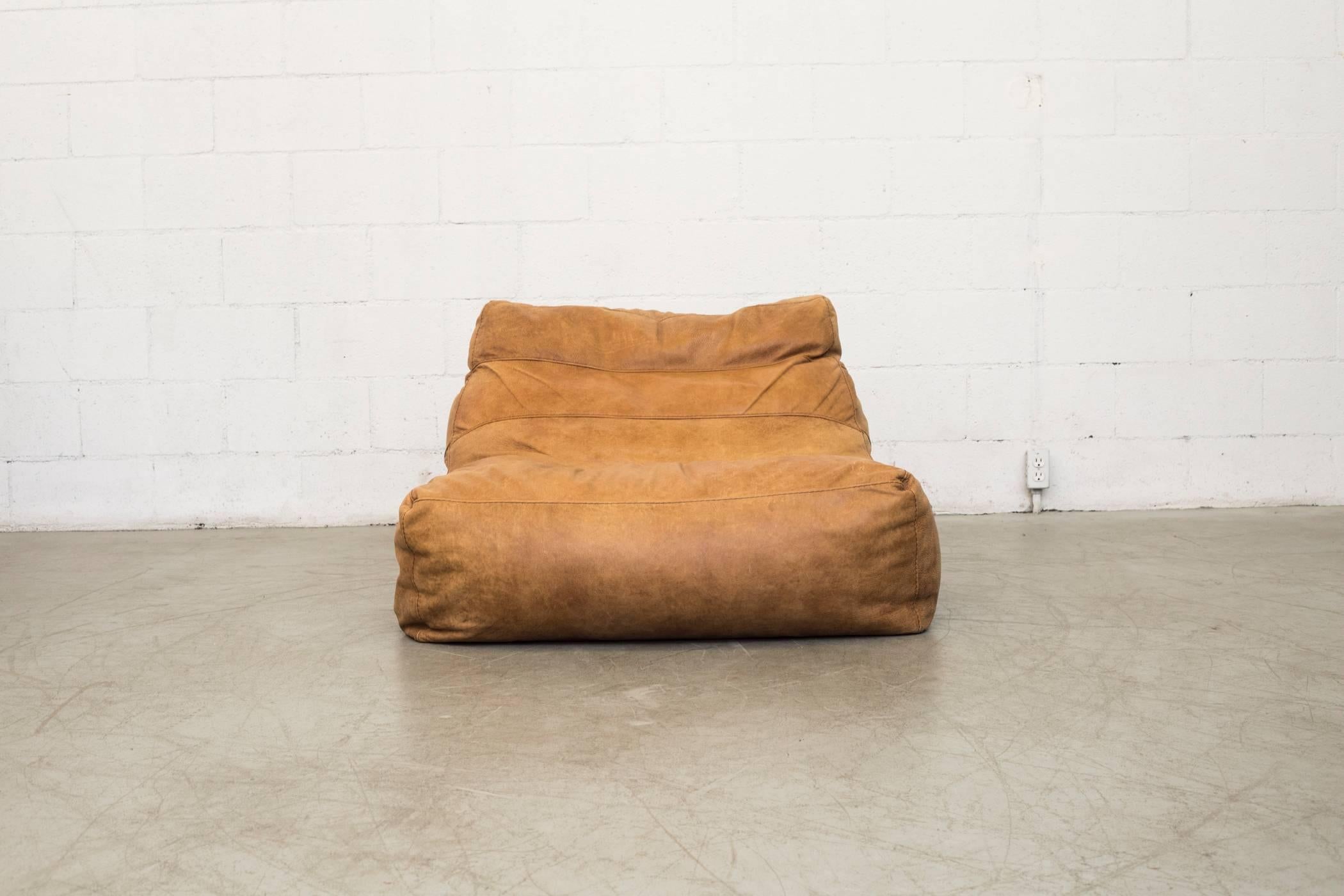 Warm brown leather bean bag lounge chair. Back strap detail. Fantastic patina. Super comfortable. Similar one available in lighter leather (S709 N). Listed separately.