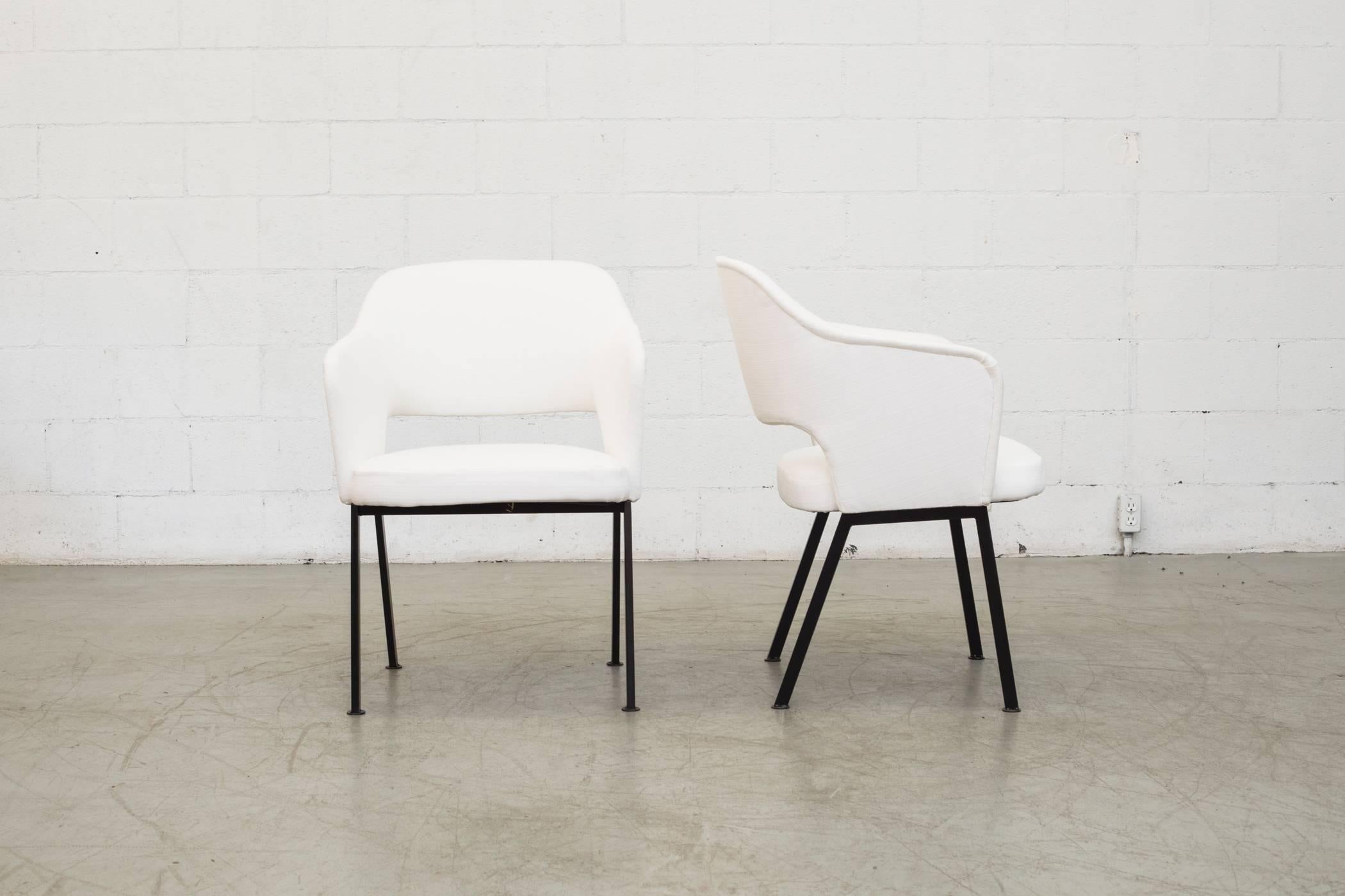 A graceful pair of classic Eero Saarinen-influenced Dutch armchairs. Originally manufactured by 