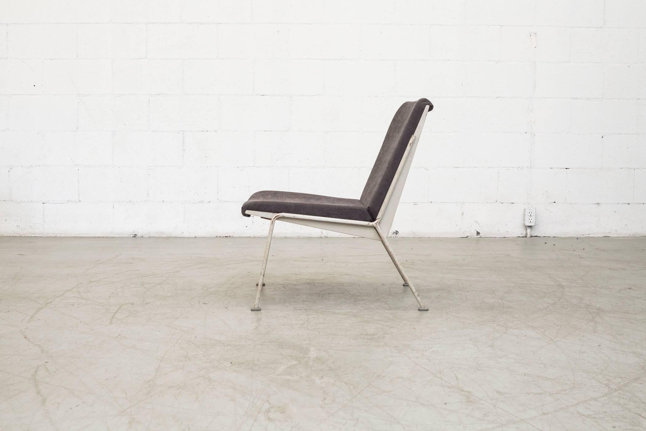 Light grey enameled metal frame in original condition with visible wear and use and new charcoal grey upholstery, designed by Wim Rietveld for Ahrend de Cirkel.