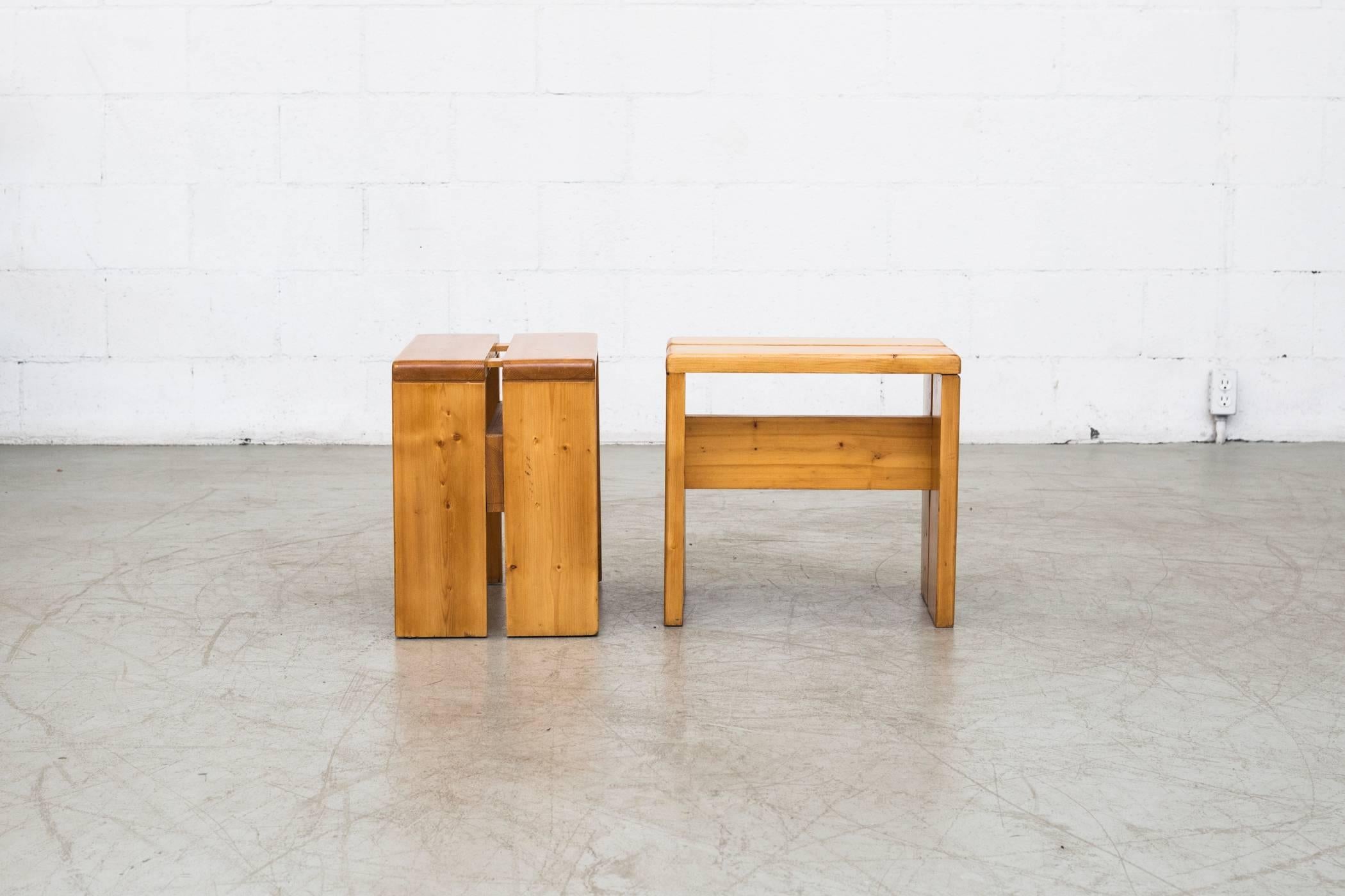 Charlotte Perriand solid pine stools from Les Arcs, France, circa 1968. In good original condition with some wear to surface consistent with age and use. Wood grains vary from set to set price.