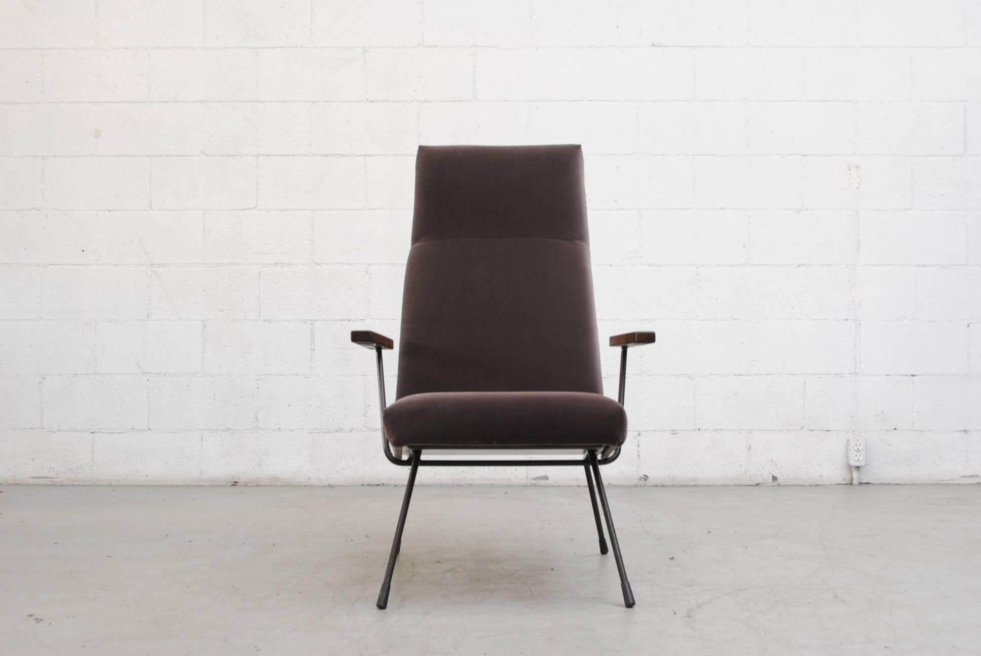 Gorgeous high back armchair by A.R. Cordemeyer with black enameled metal frame, wire legs and lightly refinished wenge arm rests . Newly upholstered in gorgeous cafe grey velvet. Frame in original condition with some signs of wear. Arm rests have