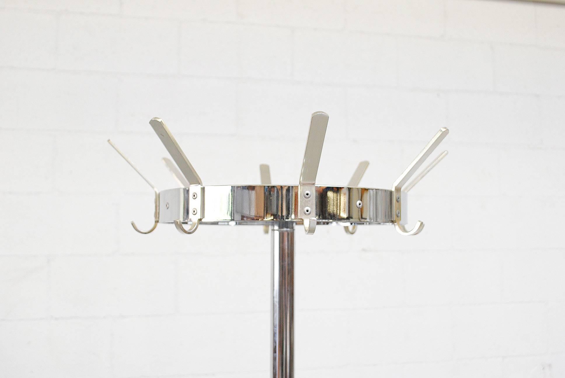 Industrial Gispen coat and hat rack in chrome with heavy grey enameled metal weighted base and lower umbrella stand. Good original condition.