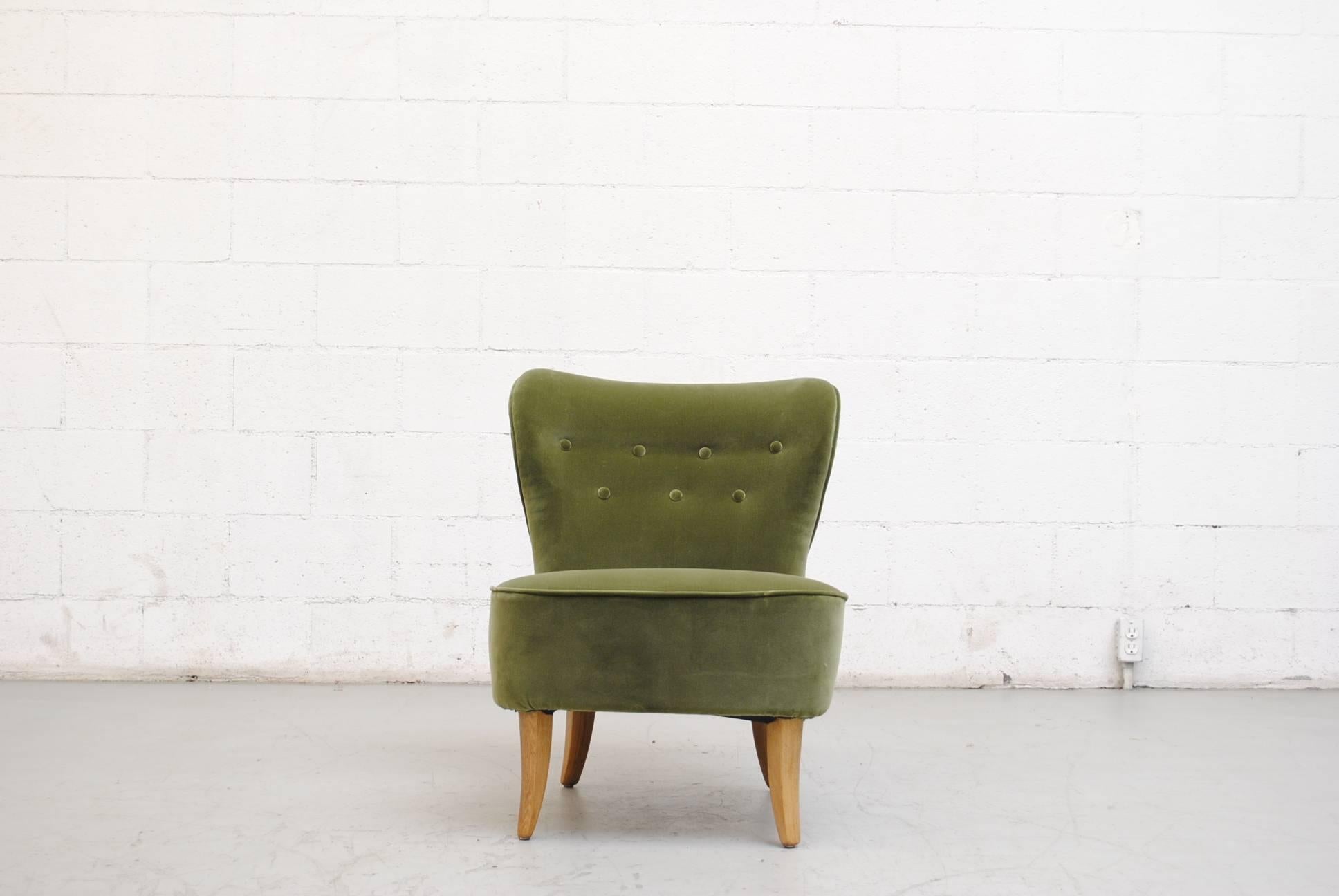 Wonderful Olive Green Velvet Theo Ruth Armless Lounge Chair with Natural Wood Legs. Newly upholstered with lightly refinished legs. Similar Lounge Chairs available and listed separately.