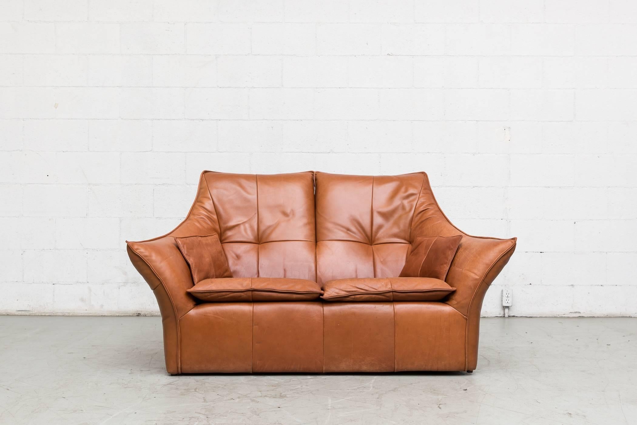 Thick cognac buffalo leather upholstered love seat 