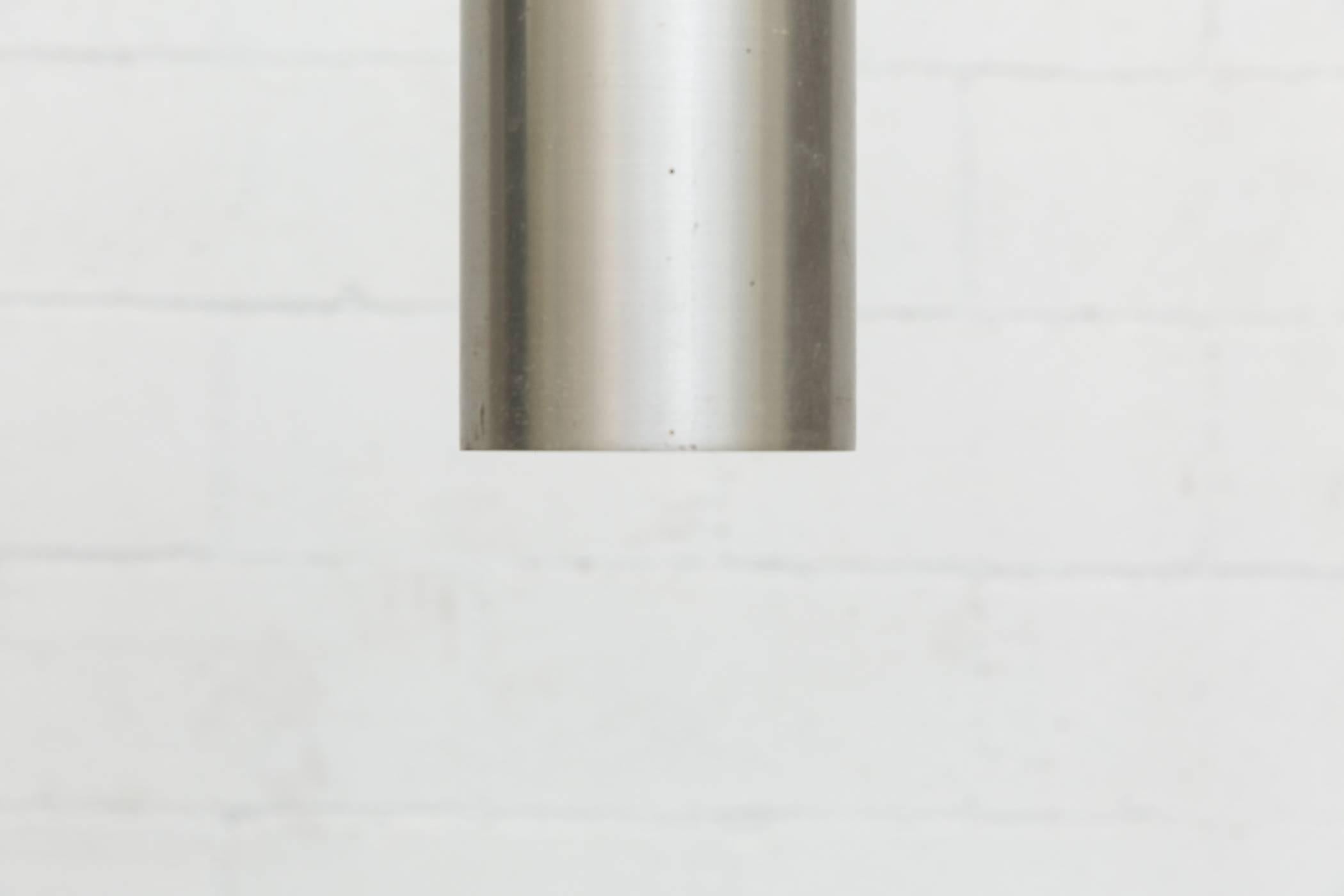 Dutch Set of Three 1960s RAAK Brushed Aluminum Tubular Pendant Lights, 1960s For Sale