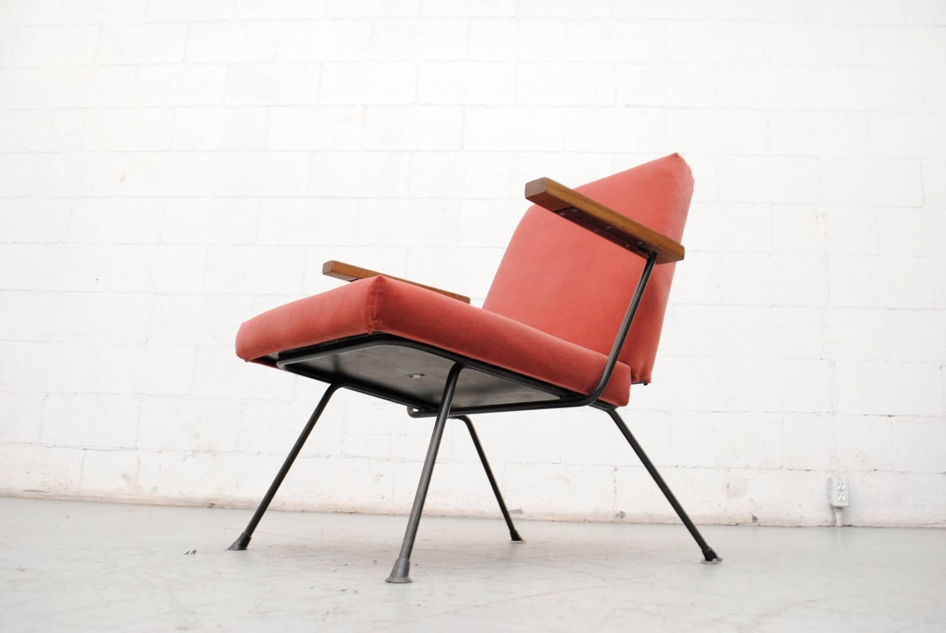 Gorgeous Dutch lounge chair by A.R. Cordemeyer with teak arms. Original black enameled metal frame. Newly upholstered in velvet. Frame shows some signs of wear consistent with its age and usage.