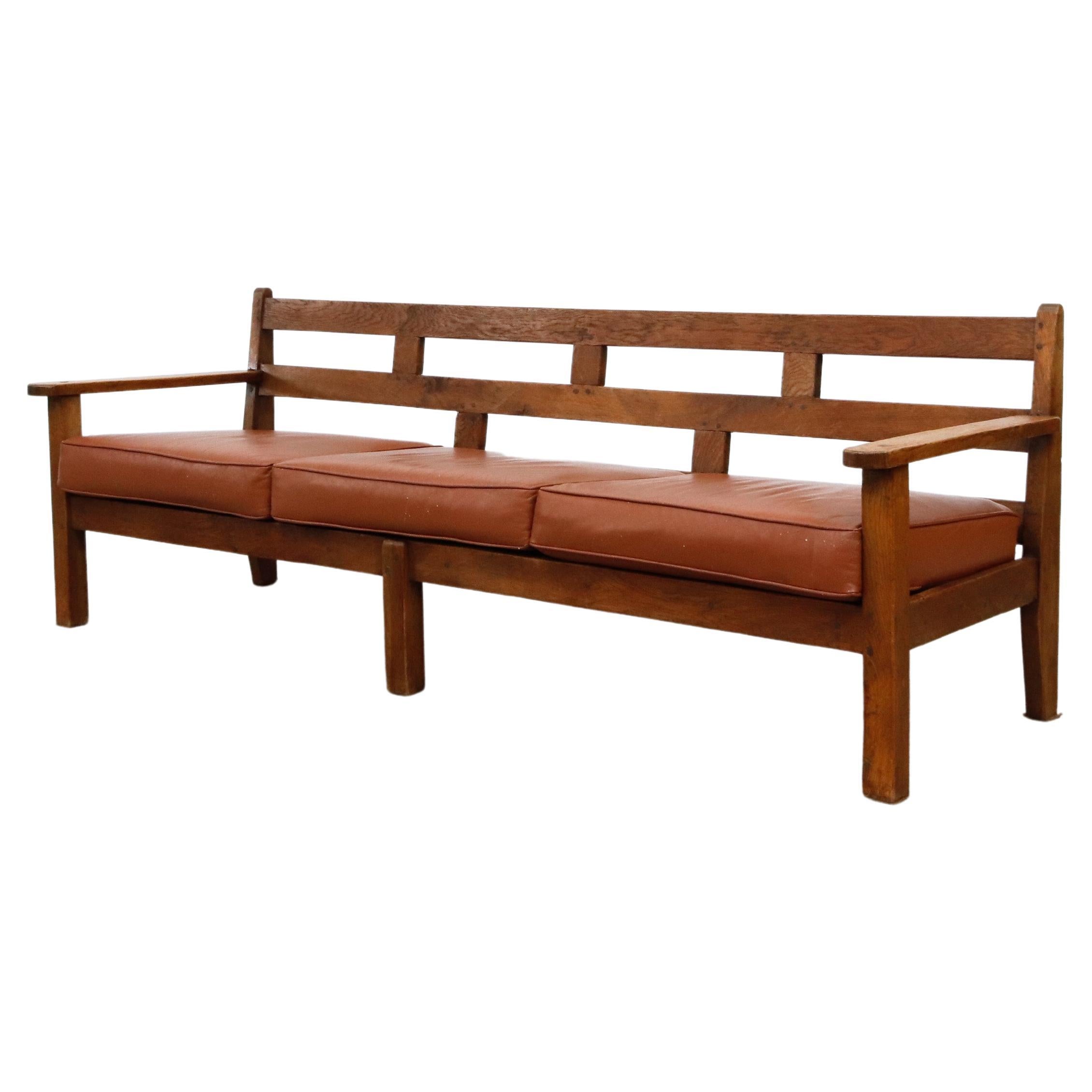 Large Dutch Oak Bench with Brown Leather Seat Cushion For Sale