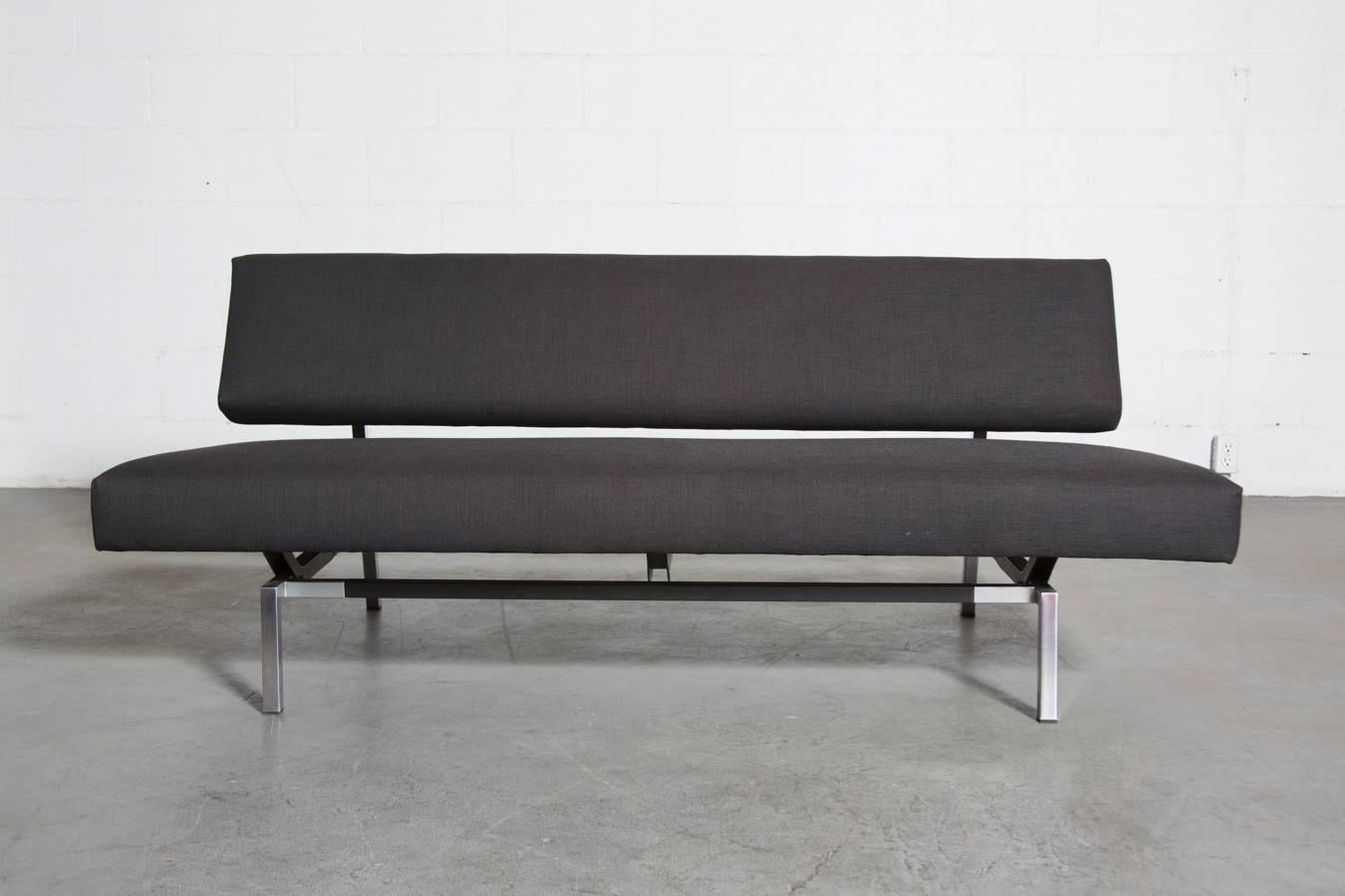 Martin Visser Style sofa with chrome and black enameled metal frame. Newly upholstered in charcoal black fabric. Frame is in original condition with some wear consistent with age and use. Super sleek and streamlined design.