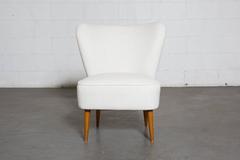 Fauteuil Boudoir sans accoudoirs à petit dossier à ailettes