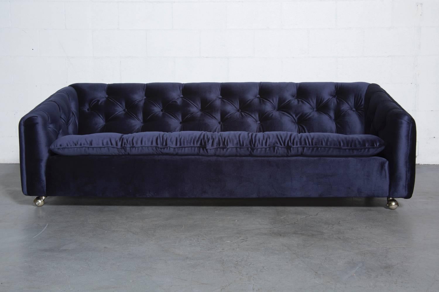 Geoffrey Harcourt / Artifort / Netherlands.
Long and luxurious three-seat navy velvet sofa. This rolling beauty has been newly upholstered.