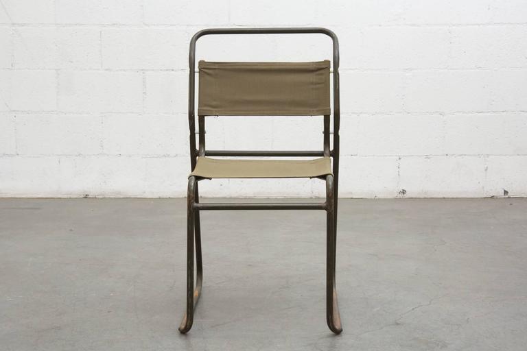 Set of Eight Stacking Army Green Canvas Chairs at 1stDibs army chairs, army green metal dining