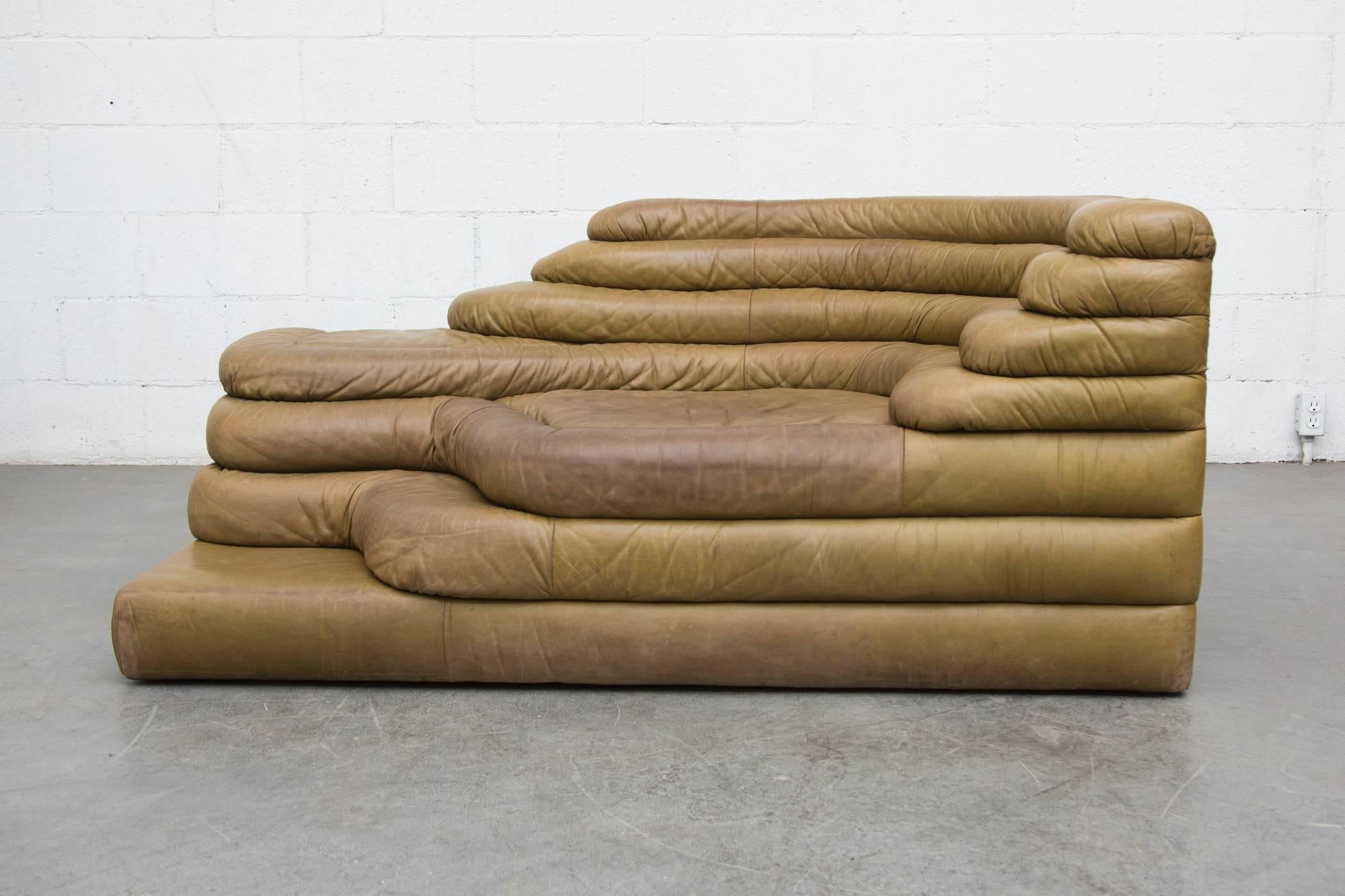 Crazy cool iconic leather landscape sofa in natural leather. Visible patina and wear by Ubald Klug for De Sede.
