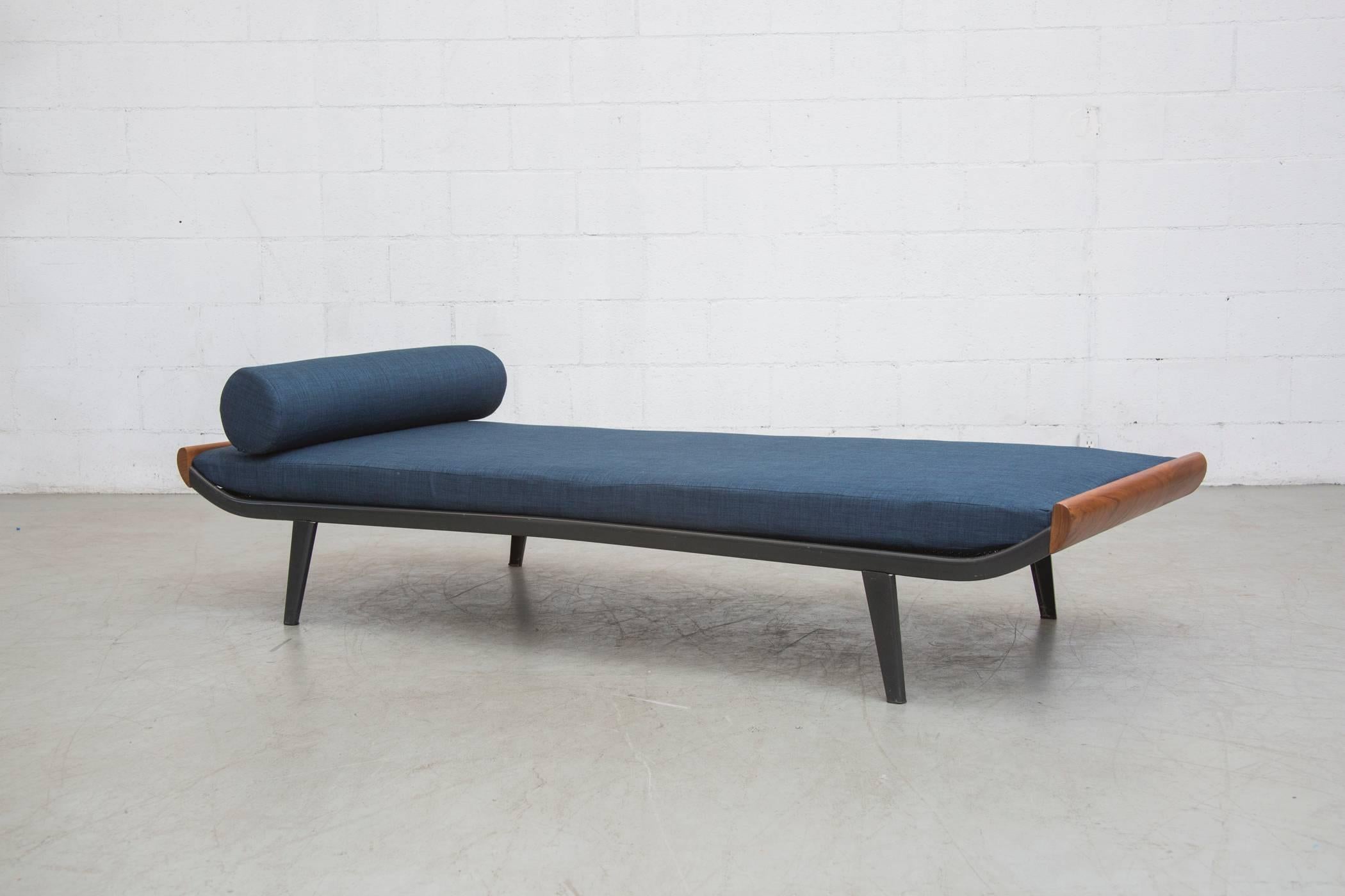 1960s Cleopatra Day Bed by A.R. Cordemeijer. Teakwood ends with enameled dark grey metal frame and 