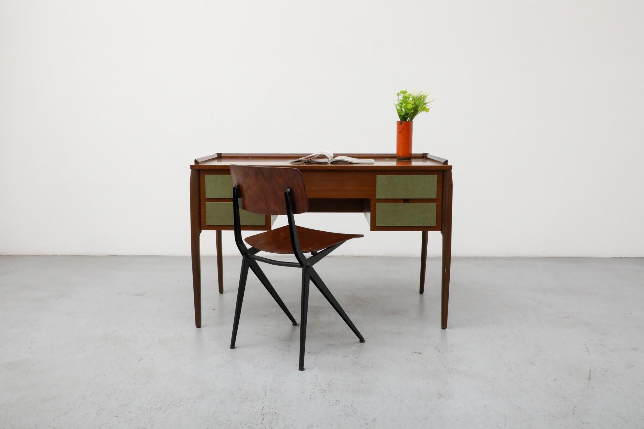 A stunning Italian Mid-Century writing desk by renowned designer Vittorio Dassi, crafted in the elegant aesthetic of Gio Ponti style. Made from a rich darker wood with contrasting beech drawer interiors, this piece embodies the quintessential