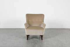 Poltrona da salotto con schienale avvolgente di Theo Ruth degli anni ’50 per Artifort, in mohair beige