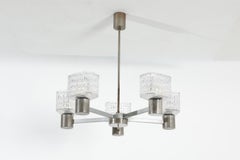 Lampadario tedesco a cinque bracci cromato degli anni ’60, attribuito a Kaiser Leuchten
