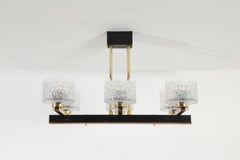German Mid-Century Black and Brass Six-Light Chandelier with Pressed Glass