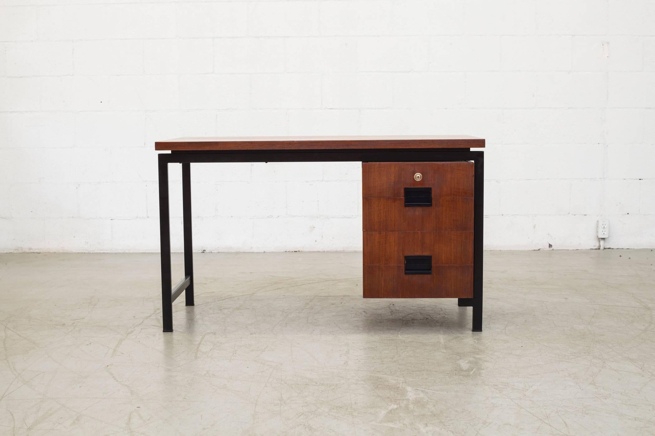 Small EU-01 desk from the Japanese series designed by Cees Braakman in 1958. Produced by Pastoe. Teak top with signature bent plywood curved drawer interior. Acrylic molded drawer pulls in original condition with some wear to the wood around edges