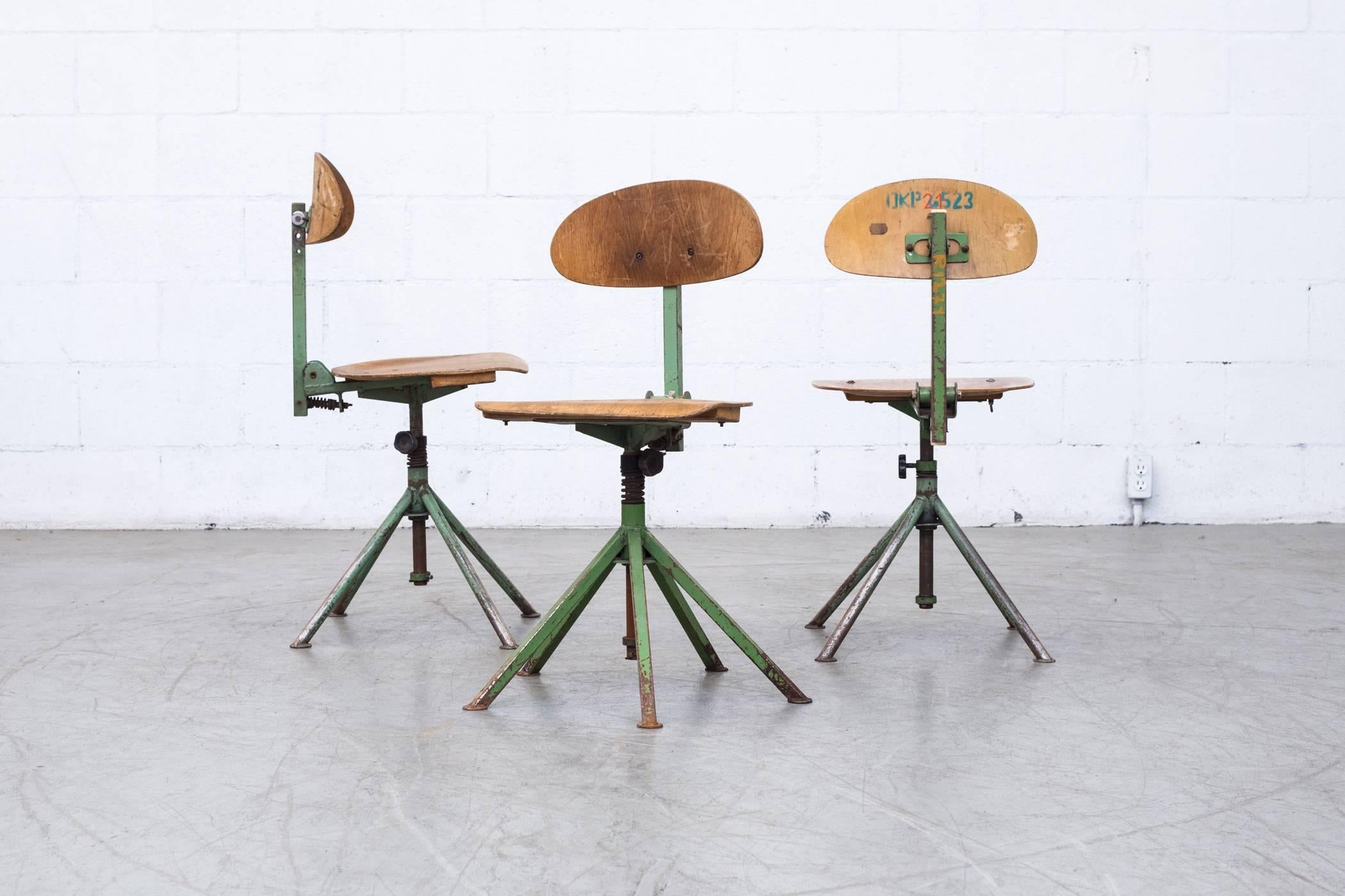 Beautifully aged and used, very well loved, original condition green enameled metal frames with well worn plywood seating. As is, patinated, condition. Sizes slightly vary, pieces may vary from pictured. Some may not actually rise and lower.

  