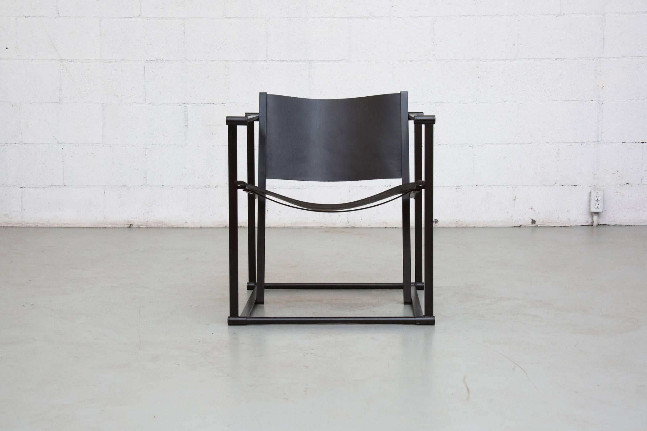 UMS Pastoe FM60, Cubic chair lounge chair, designed in 1980 by Radboud Van Beekum. Black enameled steel frame with new black leather seating. Frame is in original condition with some wear to enamel.