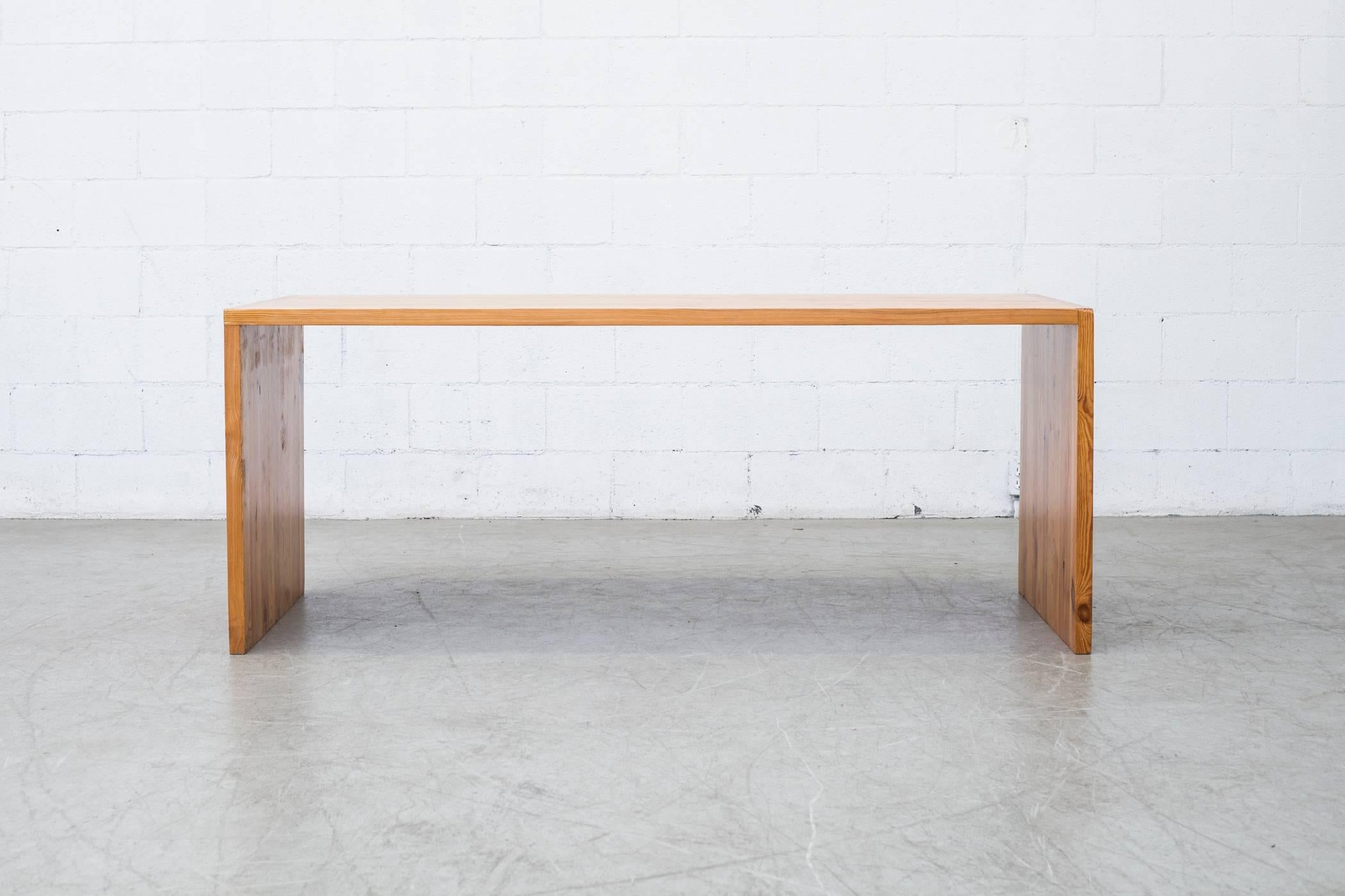 Beautifully sparse solid pine desk or table with Dovetail Joints. Designed by renowned Dutch Mid-Century master Ate Van Apeldoorn. Good original condition.