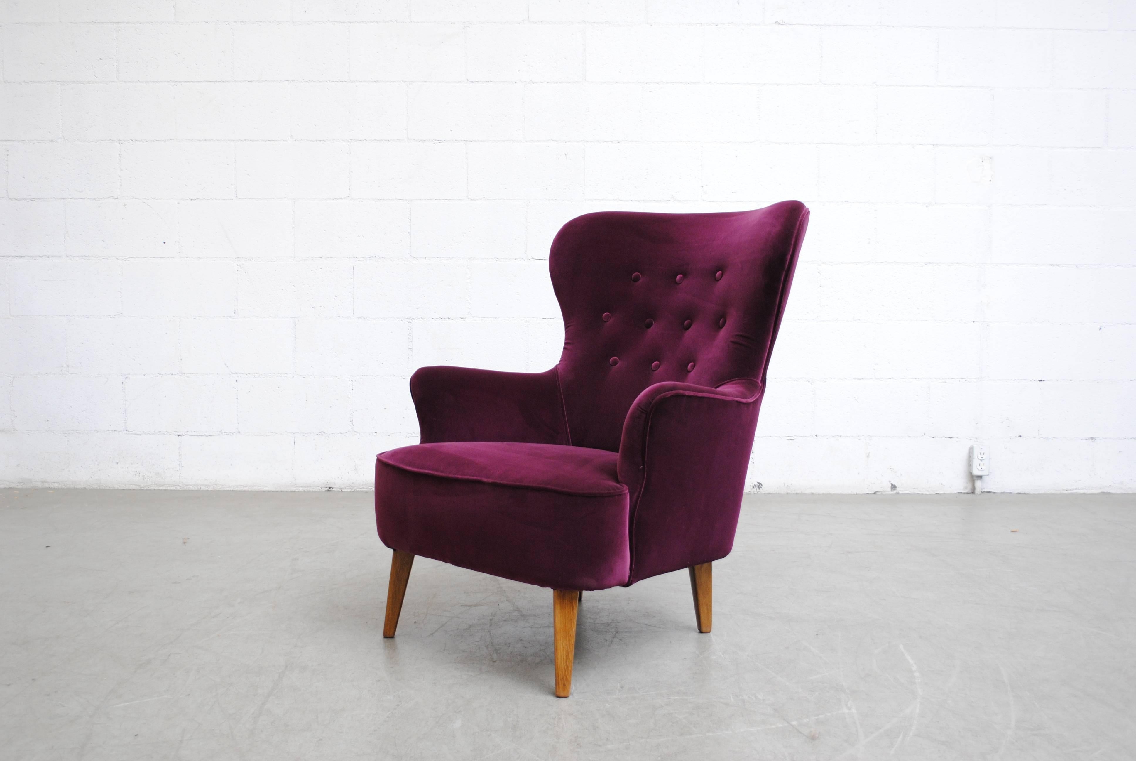 Theo Ruth lounge armchair for Artifort in brand new wine velvet upholstery. Legs are lightly refinished. Other colors and variations available, listed separately (S507).