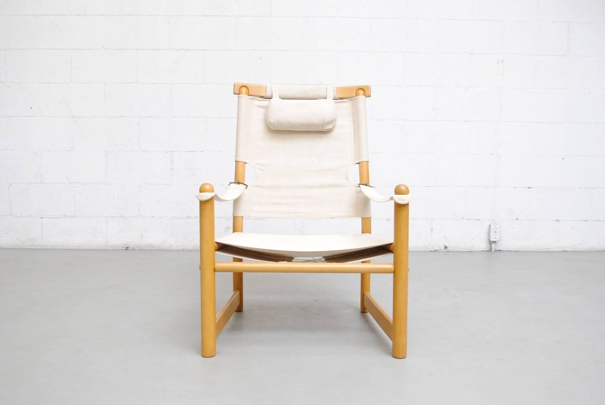 Canvas Safair Campaign chair with natural wood frame and canvas seat. In original condition.