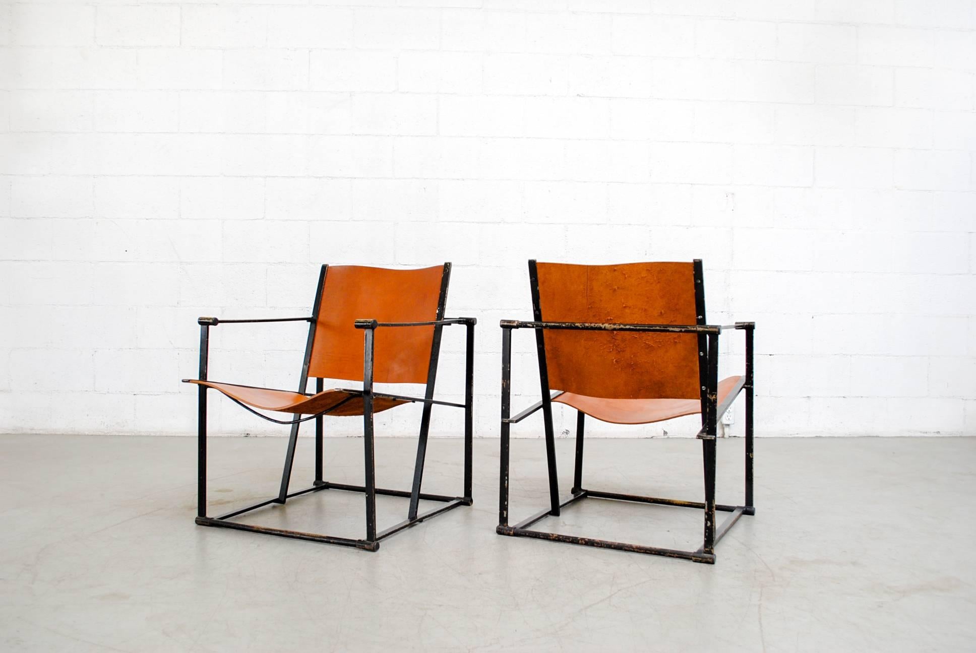 UMS Pastoe FM60, cubic lounge chair, designed in 1980 by Radboud van Beekum. Black enameled steel frame with new natural leather seating. Frames are in very original and worn condition with some heavy wear to enamel. New aged-like leather has been