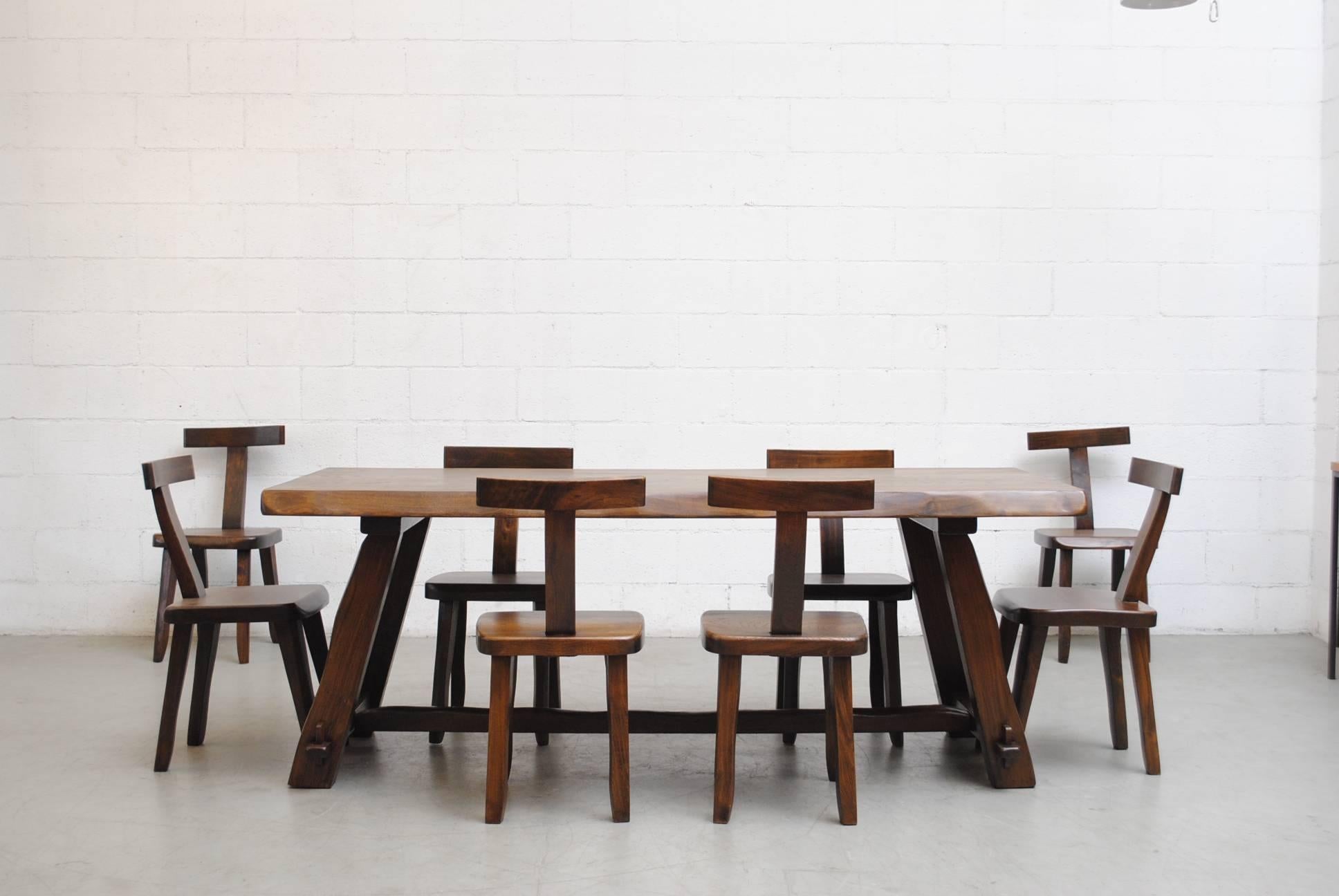 Finnish dining set by Olavi Hänninen for Mikko Nupponen, 1950s, rich black walnut table and 8 't' shaped chairs in original condition with visible signs of wear consistent with its age and usage. Sold as set. Also available are another set of eight