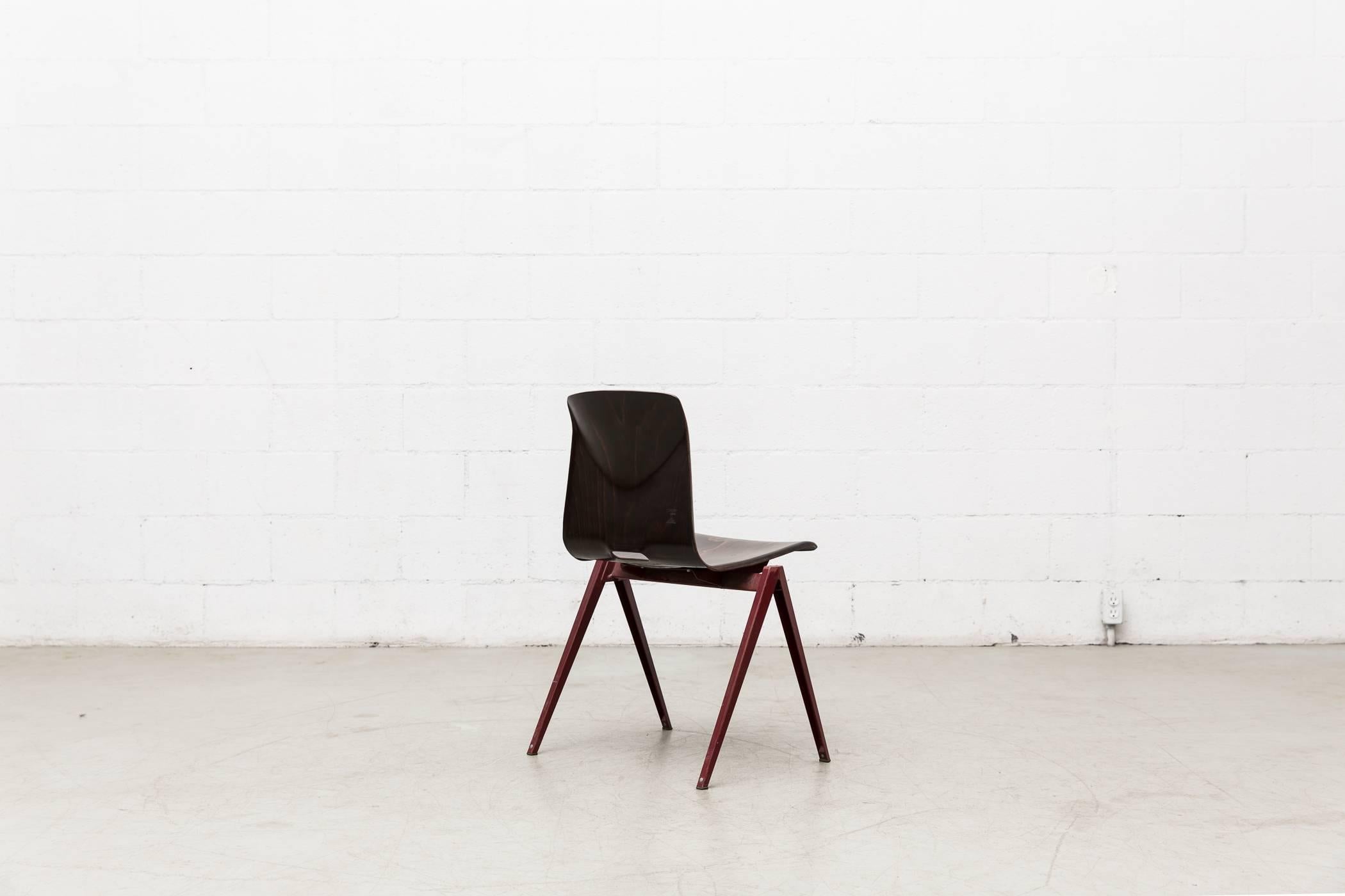 Mid-20th Century Prouve Style Single Shell Industrial Stacking Chair with Wine Red Legs