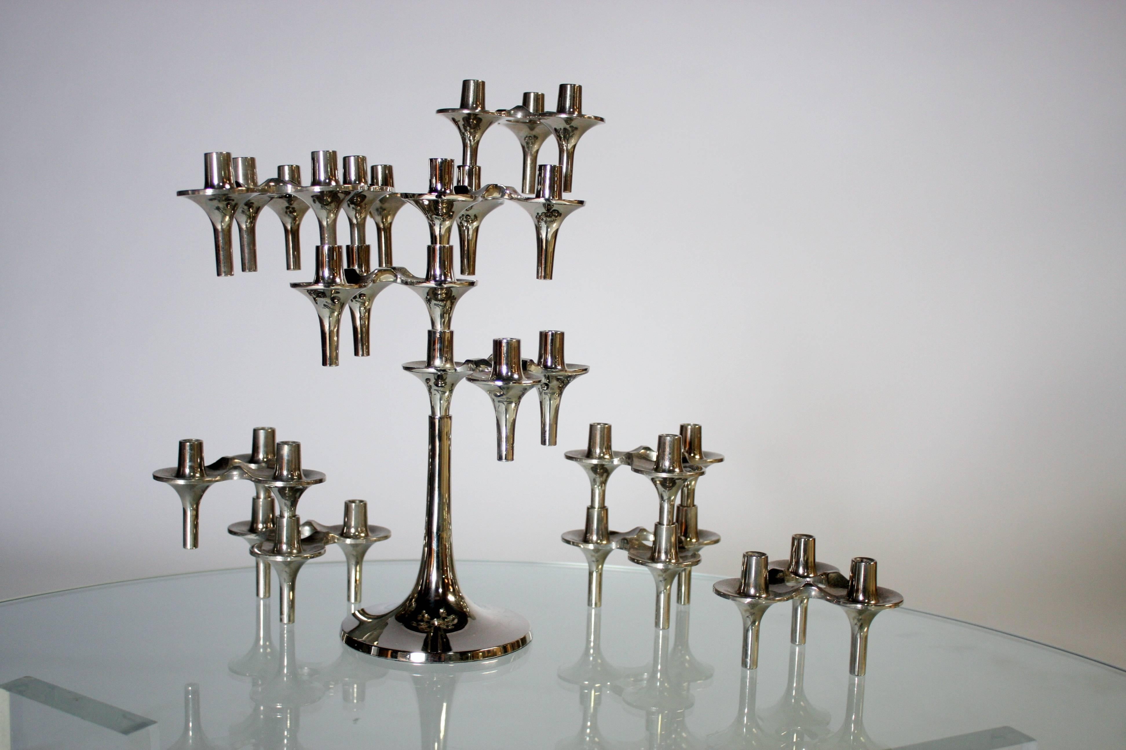 Ceasar Stoffi and Fritz Nagel modular nickel candle holder and base by BMF This is a smaller size BMF candlestick system and rare. It comes from (West) Germany. Manufacturer BMF (Bayerische Metall Fabrik). 12 piece set including the rare base.
Base