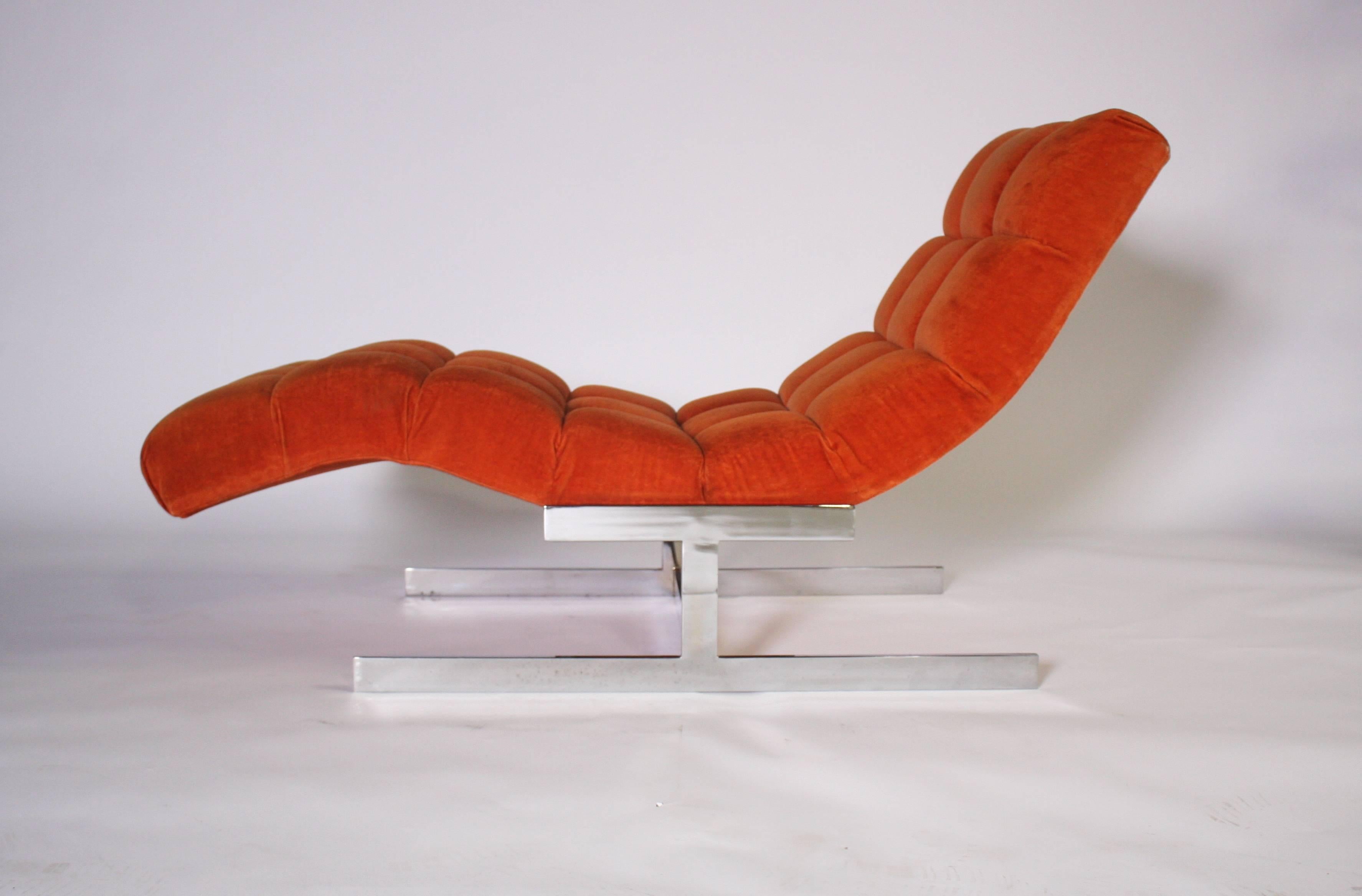 Iconic 1970s wave chaise longue after Milo Baughman in original orange biscuit tufted upholstery on a chrome steel frame.