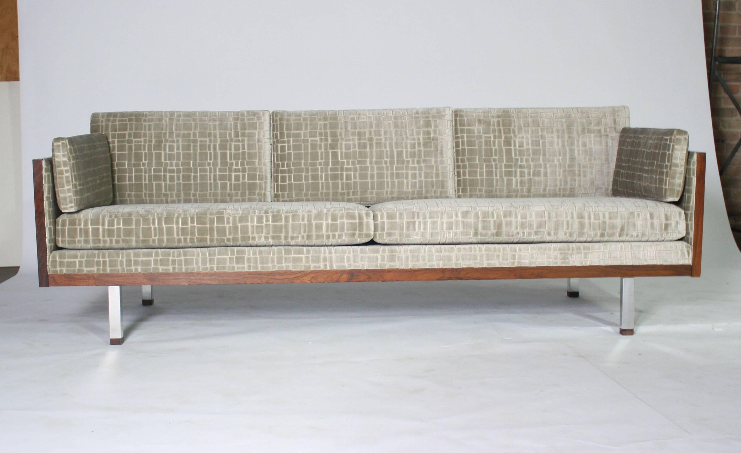 1970s Milo Baughman style rosewood case tuxedo sofa newly upholstered in a silver gray block pattern velvet in excellent condition.