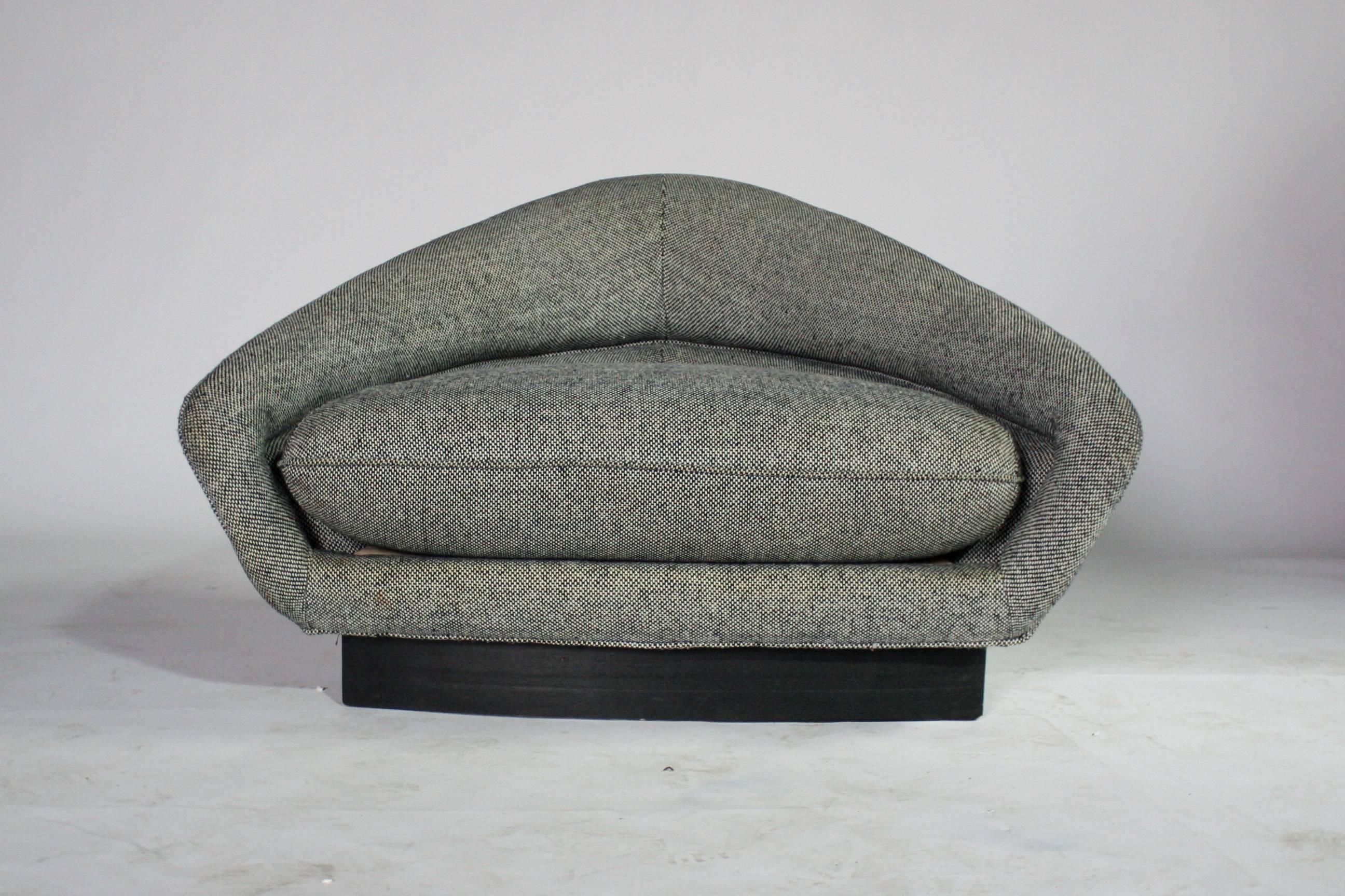 Very rare and unusual triangle shaped chair in the style of Adrian Pearsall in a black and white textured fabric on a black base. Sits low and comfortably - ideal for an accent chair in the corner of a room or as a statement in a grouping.